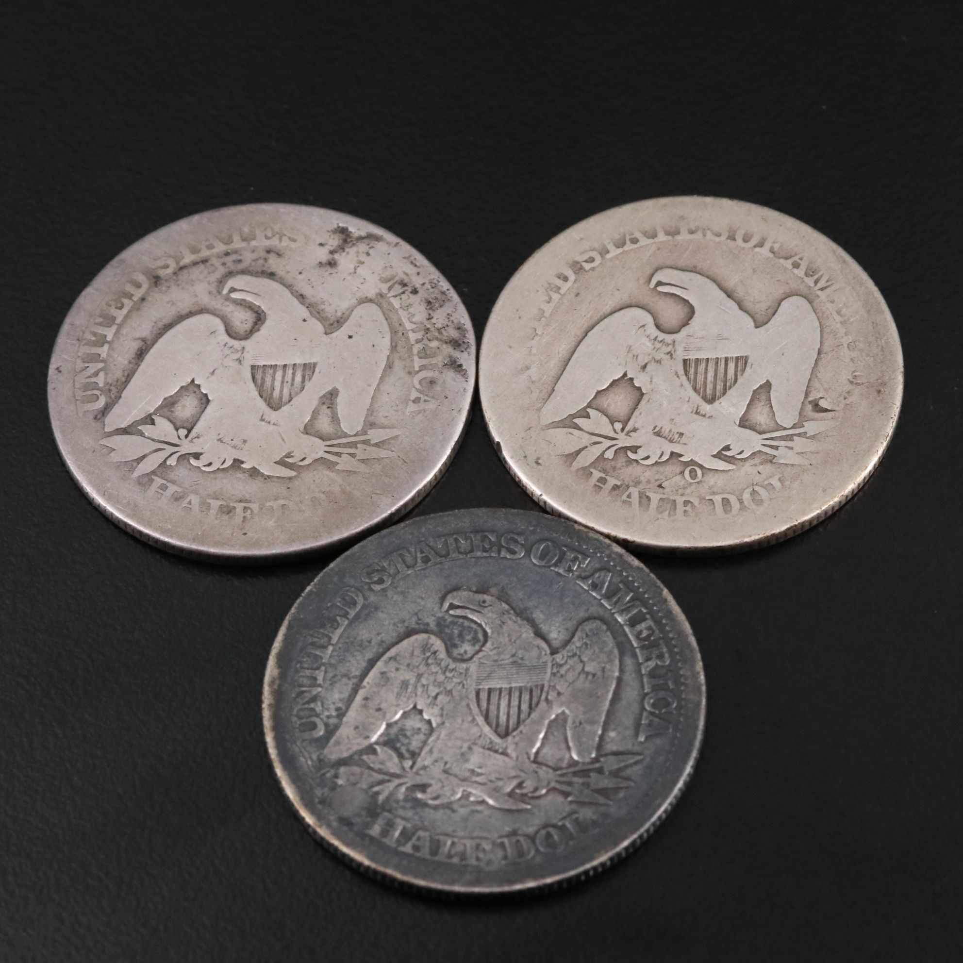 Three Seated Liberty Silver Half Dollars Including an 1855