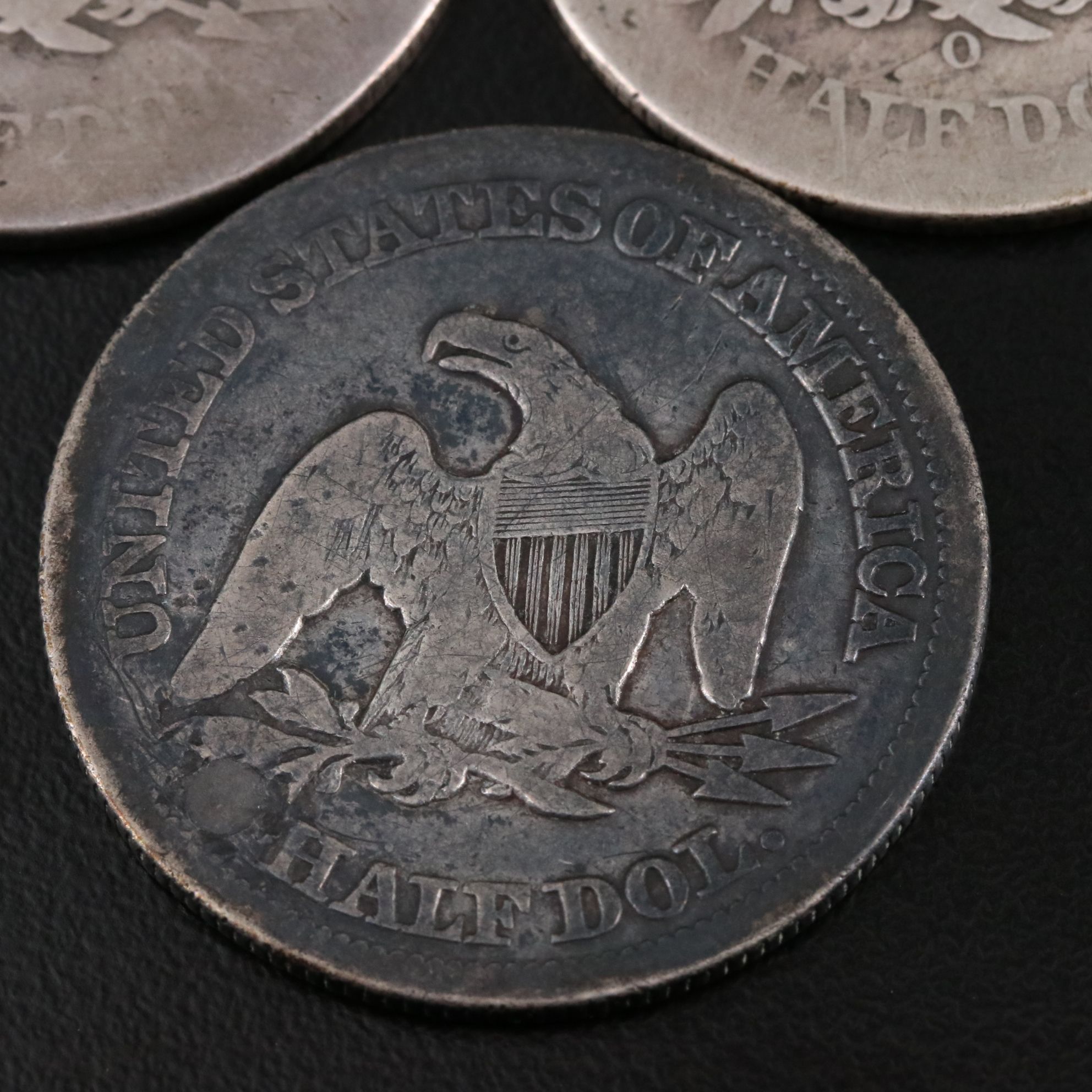Three Seated Liberty Silver Half Dollars Including an 1855