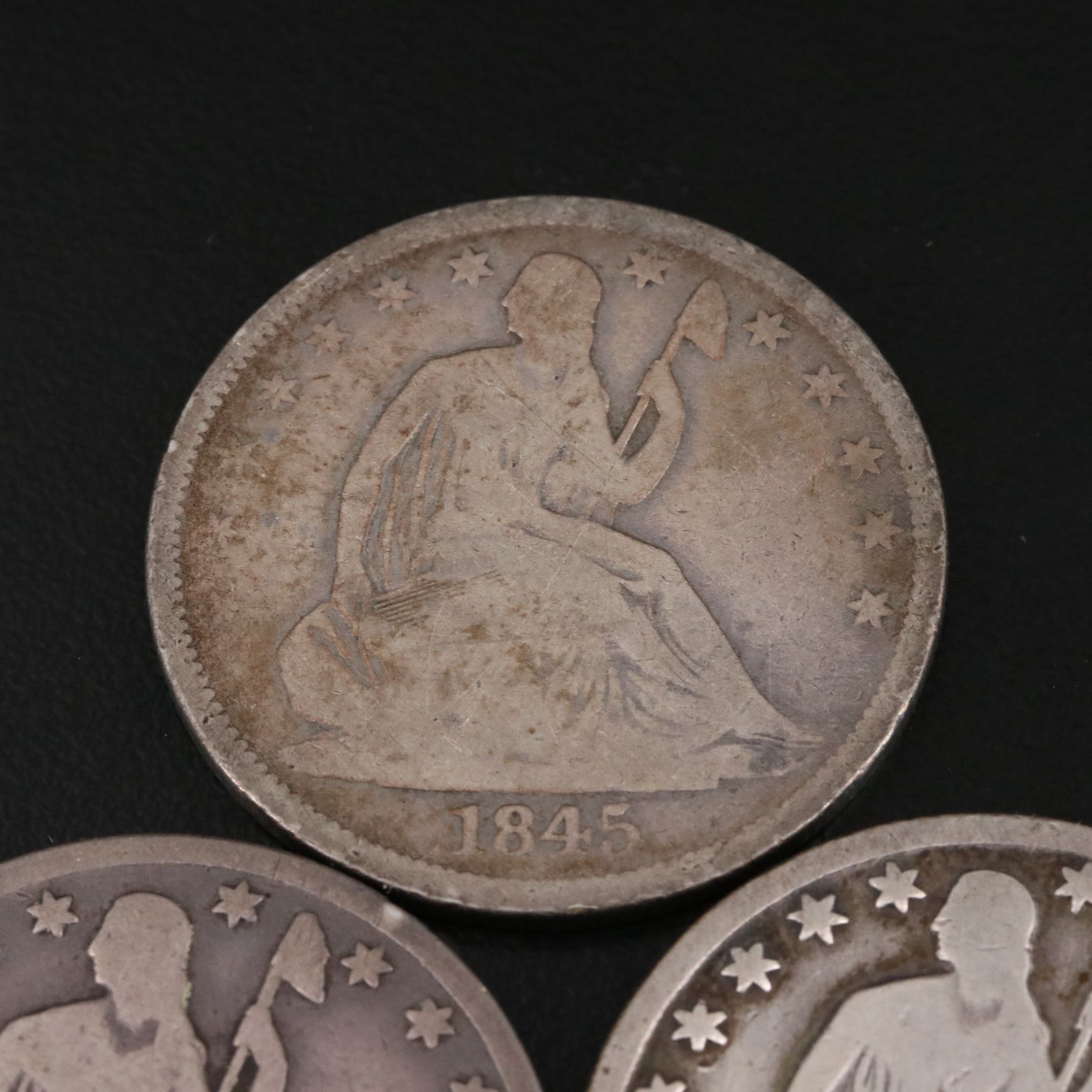 Three Seated Liberty Silver Half Dollars Including an 1845-O