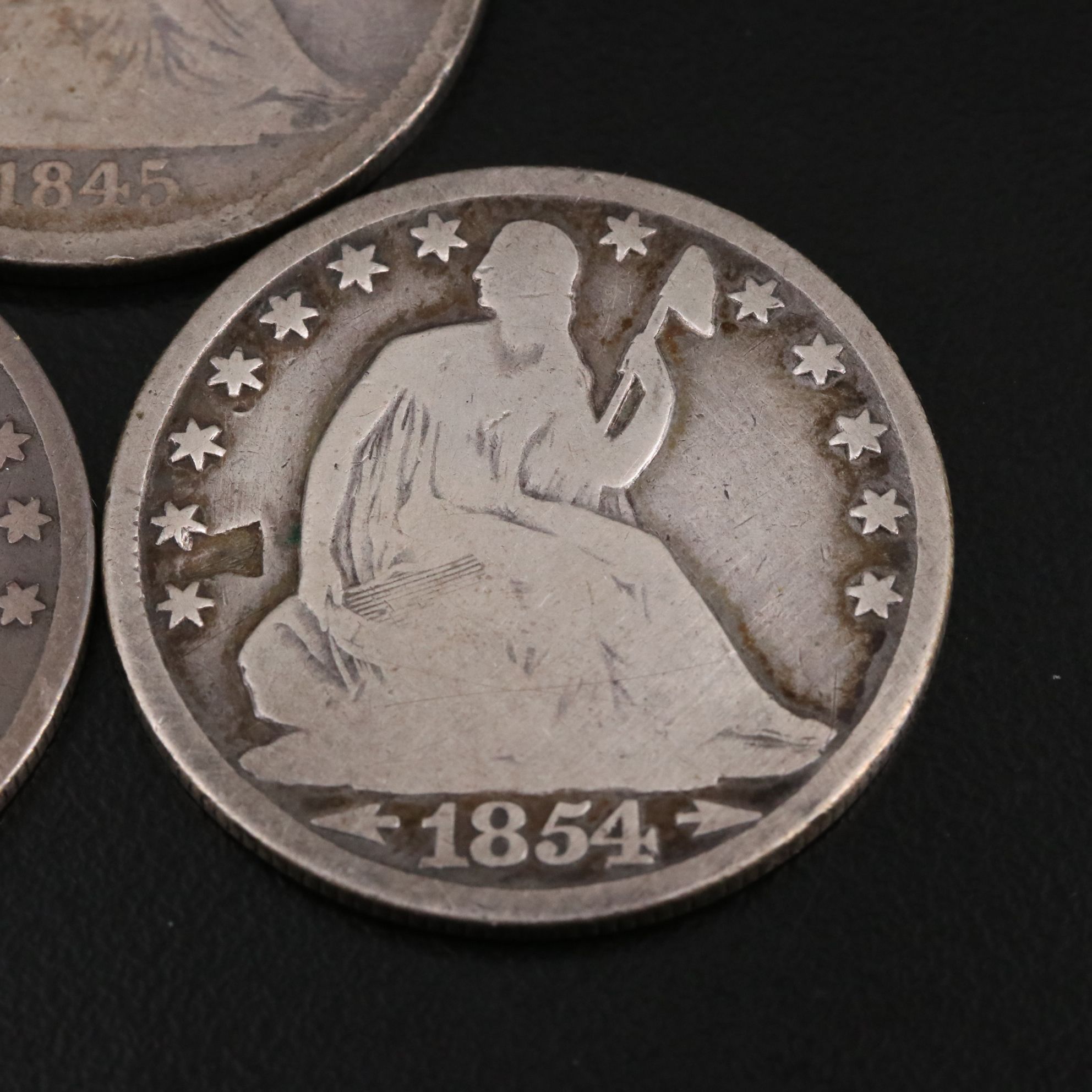 Three Seated Liberty Silver Half Dollars Including an 1845-O