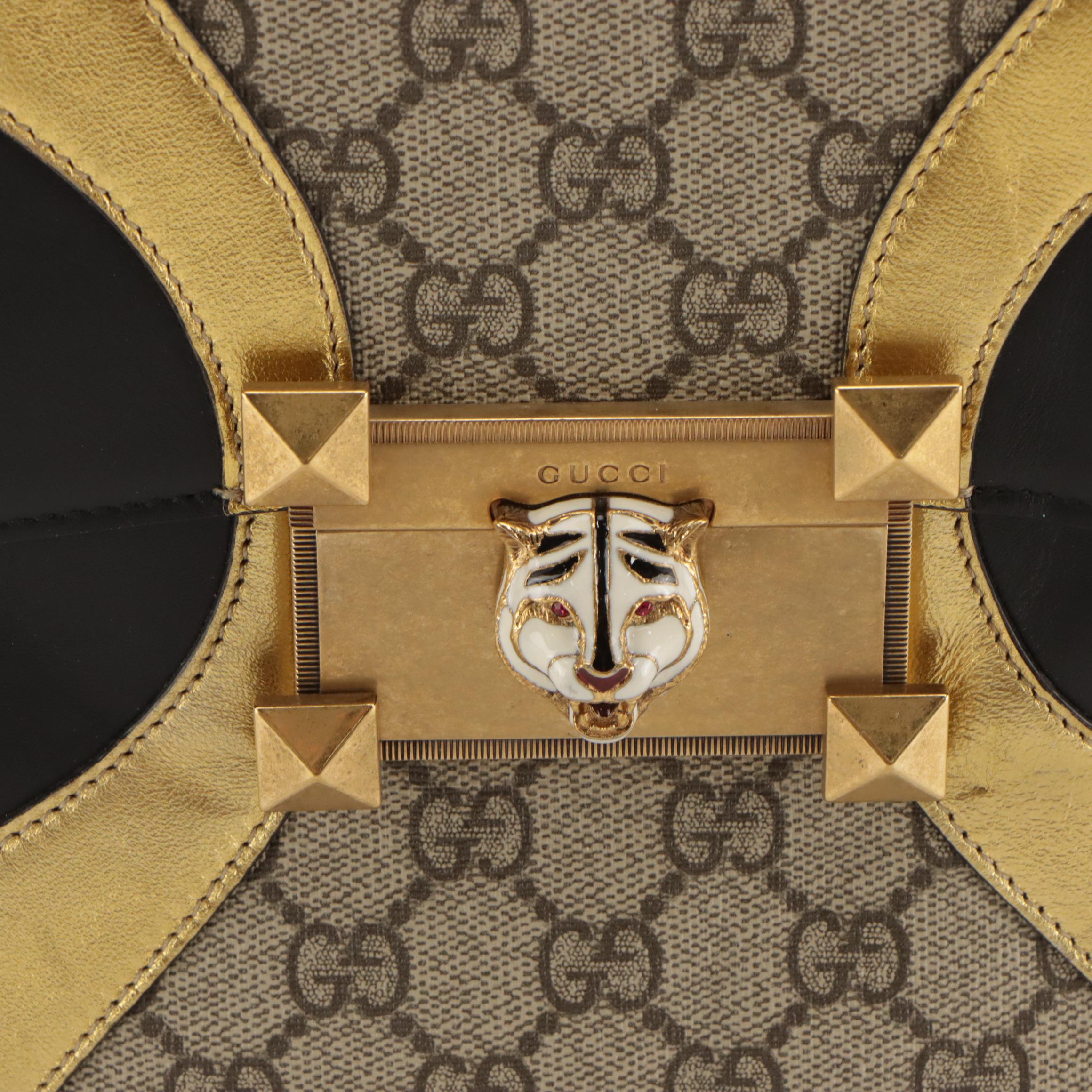 Gucci Osiride Top Handle Bag in GG Supreme Canvas & Black/Metallic Gold Leather