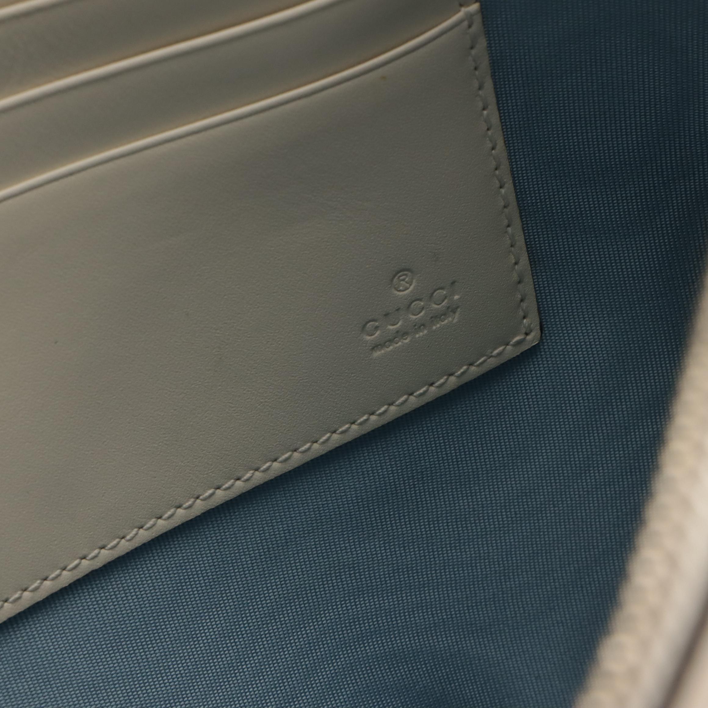 Gucci ''GUCCY'' Zip Wristlet Clutch in Star Printed Calfskin Leather, With Box