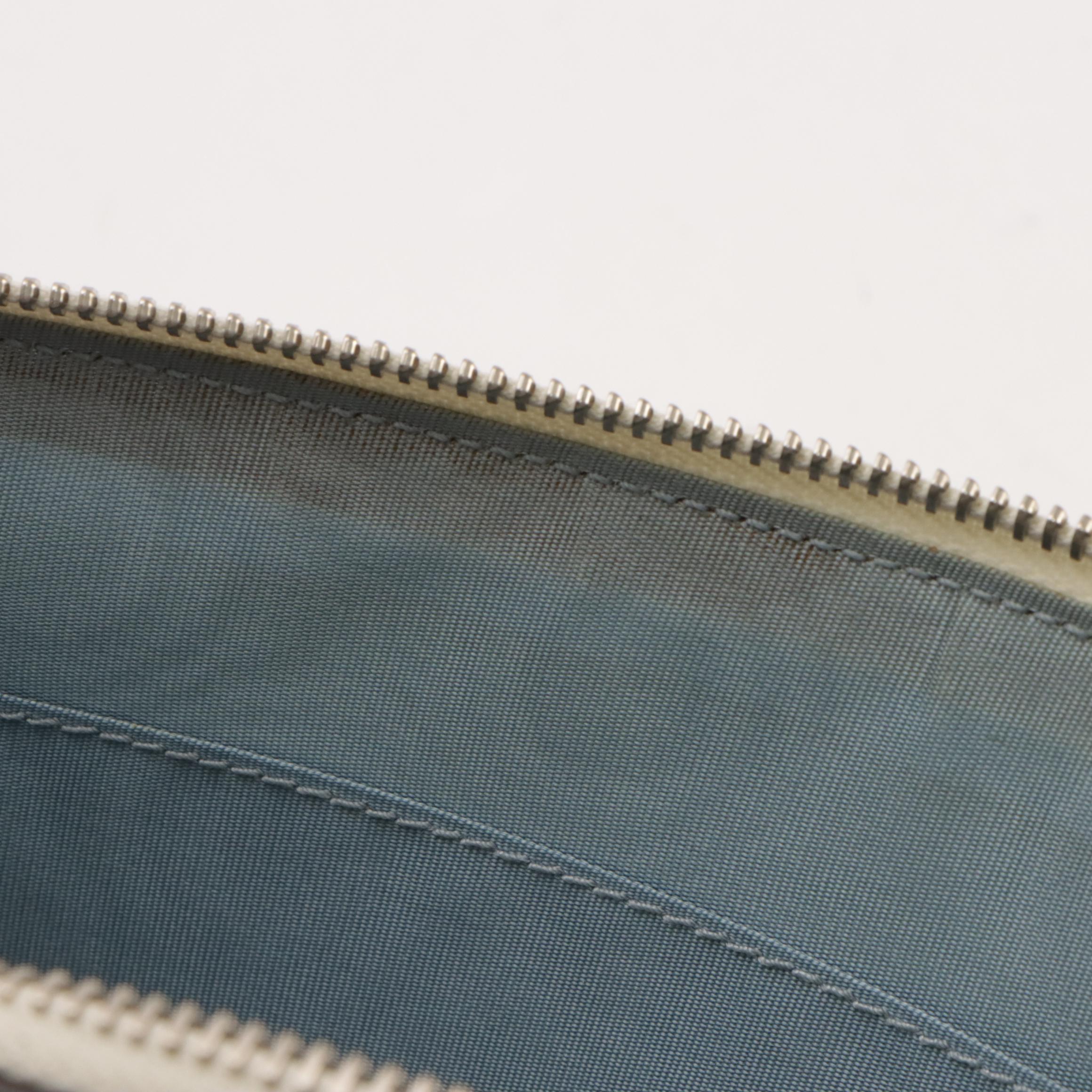 Gucci ''GUCCY'' Zip Wristlet Clutch in Star Printed Calfskin Leather, With Box