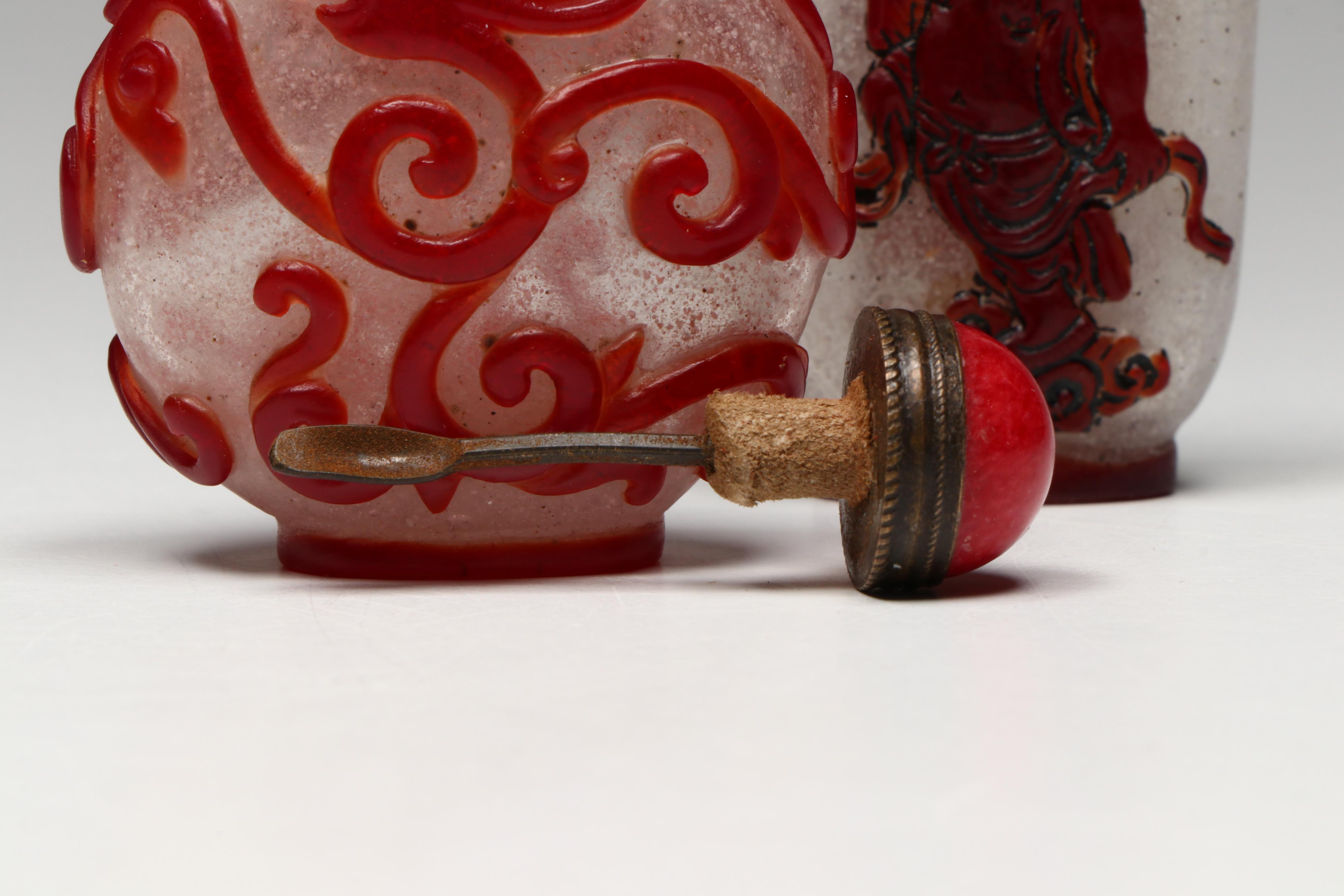 Chinese Carved Serpentine, Quartz and Coral Snuff Bottles