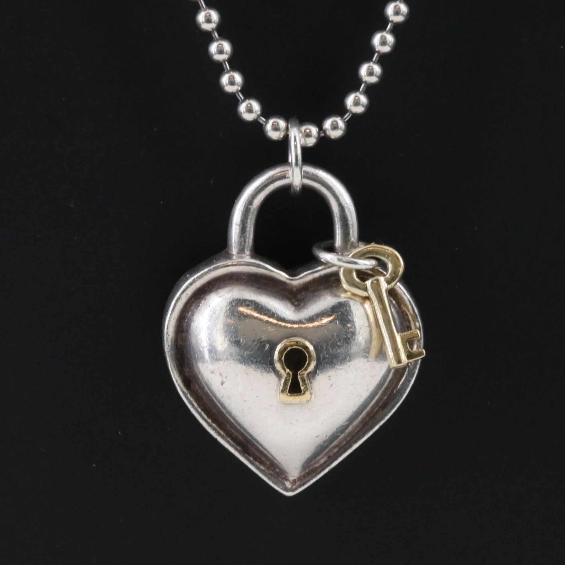 Tiffany & Co. Sterling and 18K Heart Lock Key Pendant Necklace