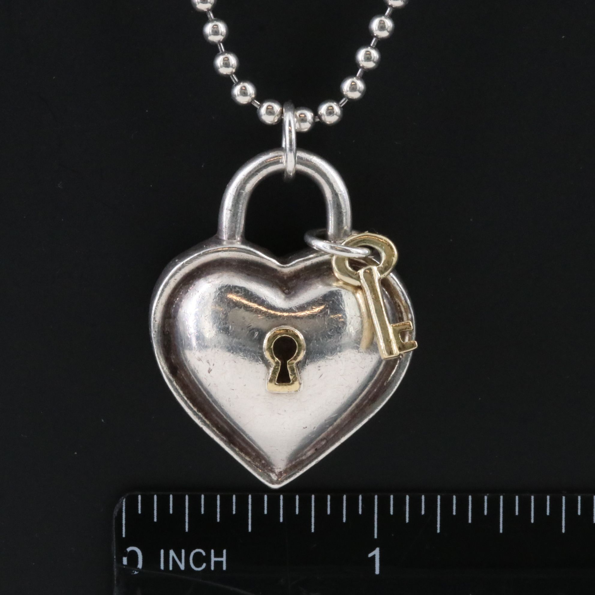 Tiffany & Co. Sterling and 18K Heart Lock Key Pendant Necklace