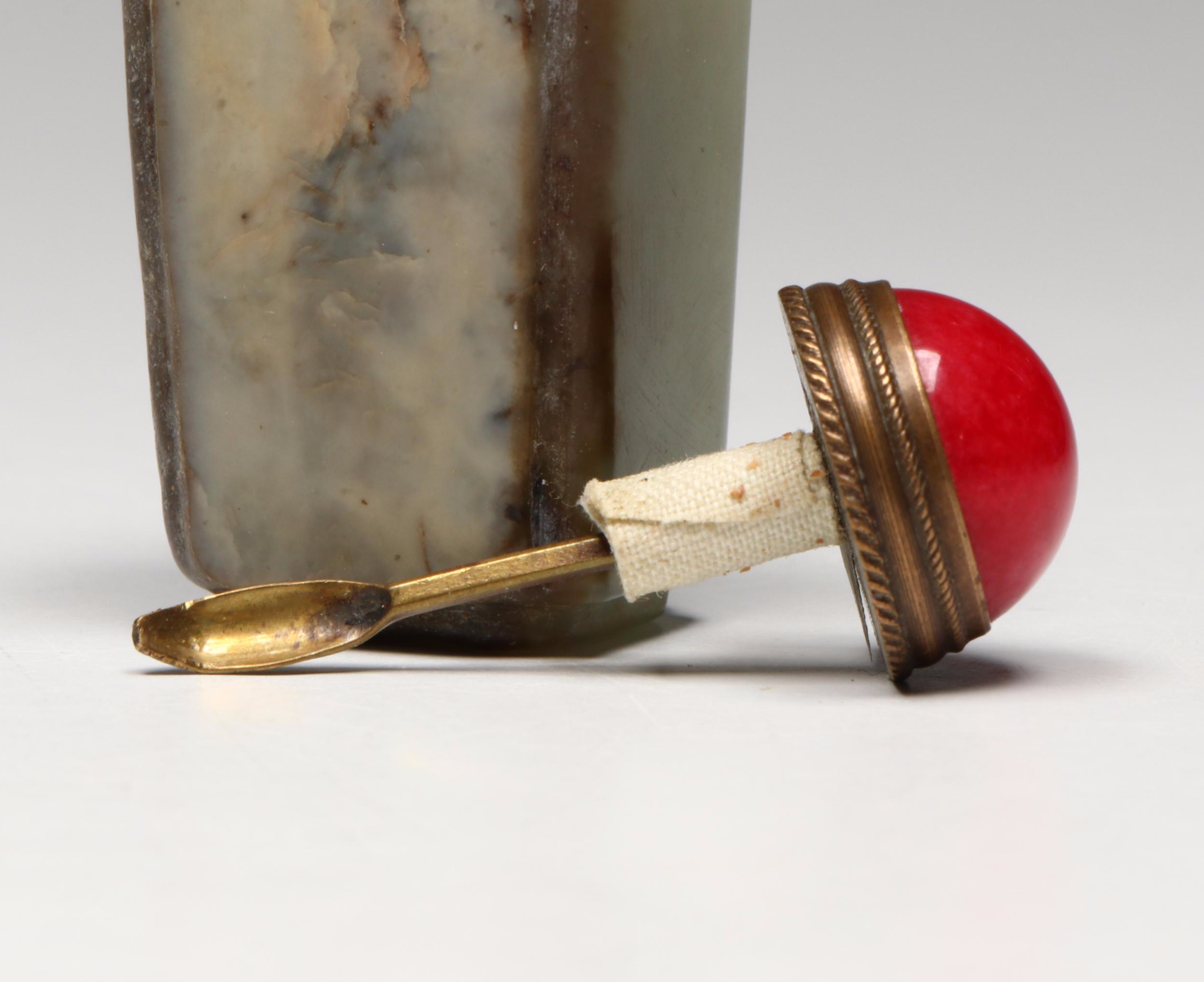 Chinese Carved Serpentine and Quartz Snuff Bottles