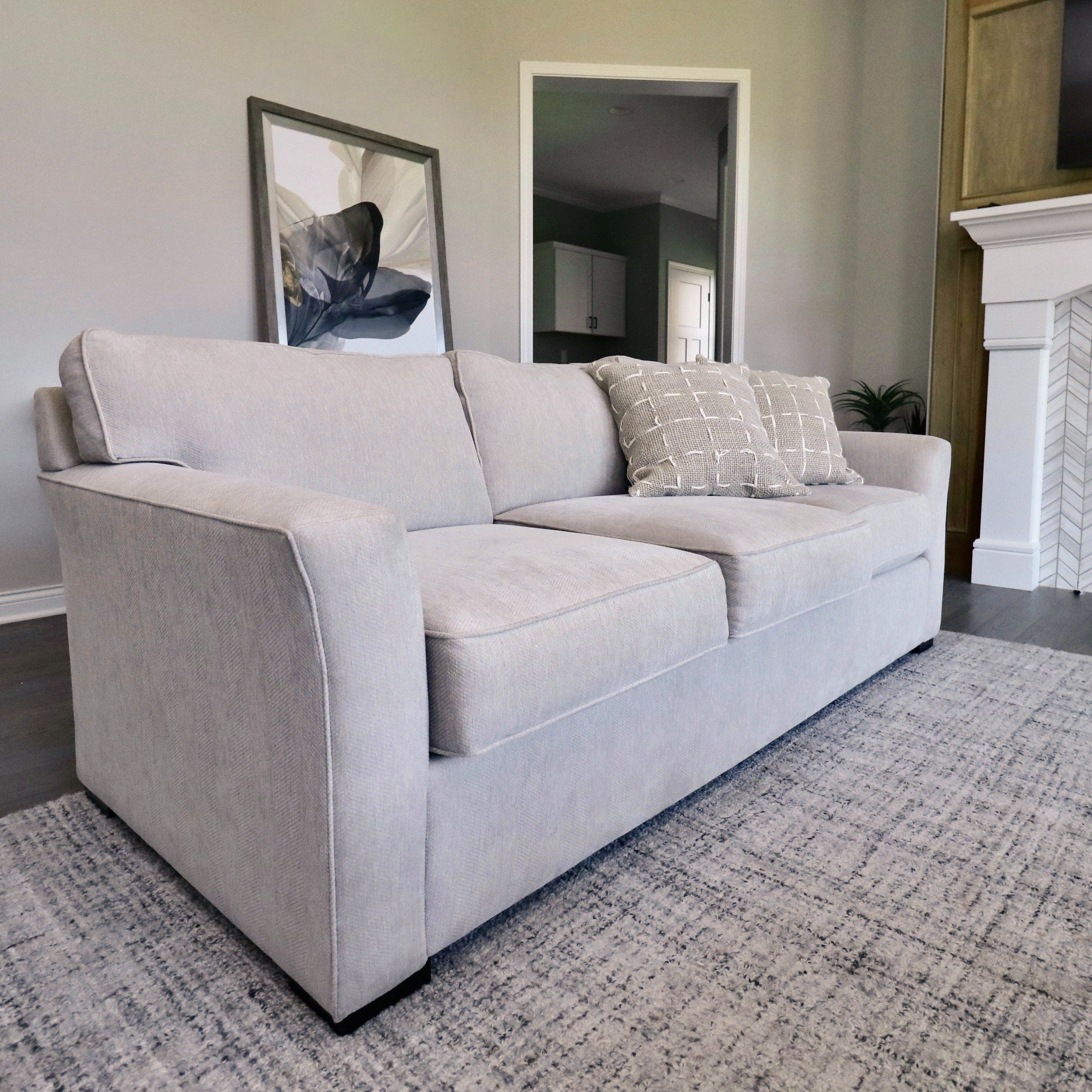 Living Spaces "Linden" Beige Upholstered Sofa and Linen Blend Pillows