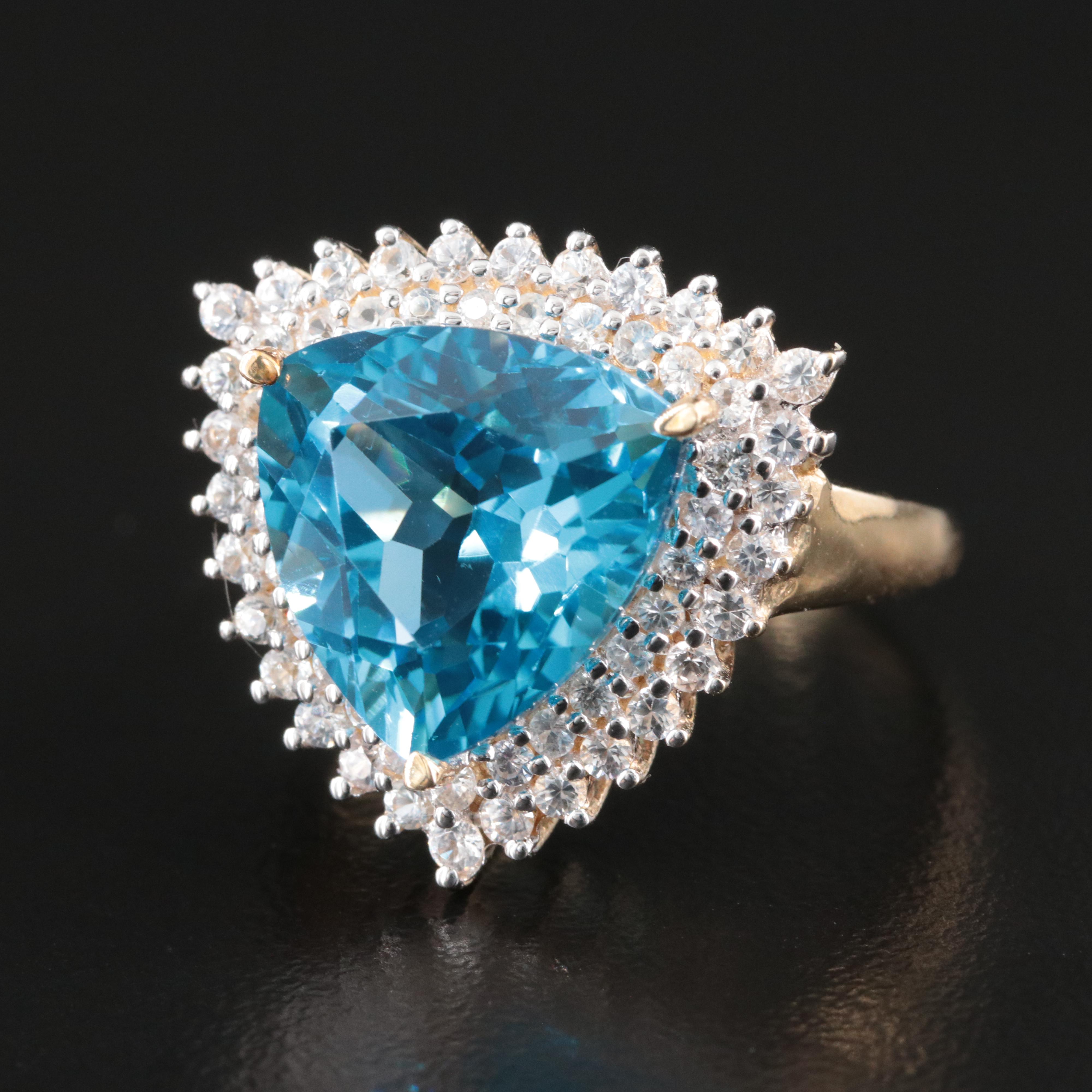 10K Blue and White Topaz Double Halo Ring