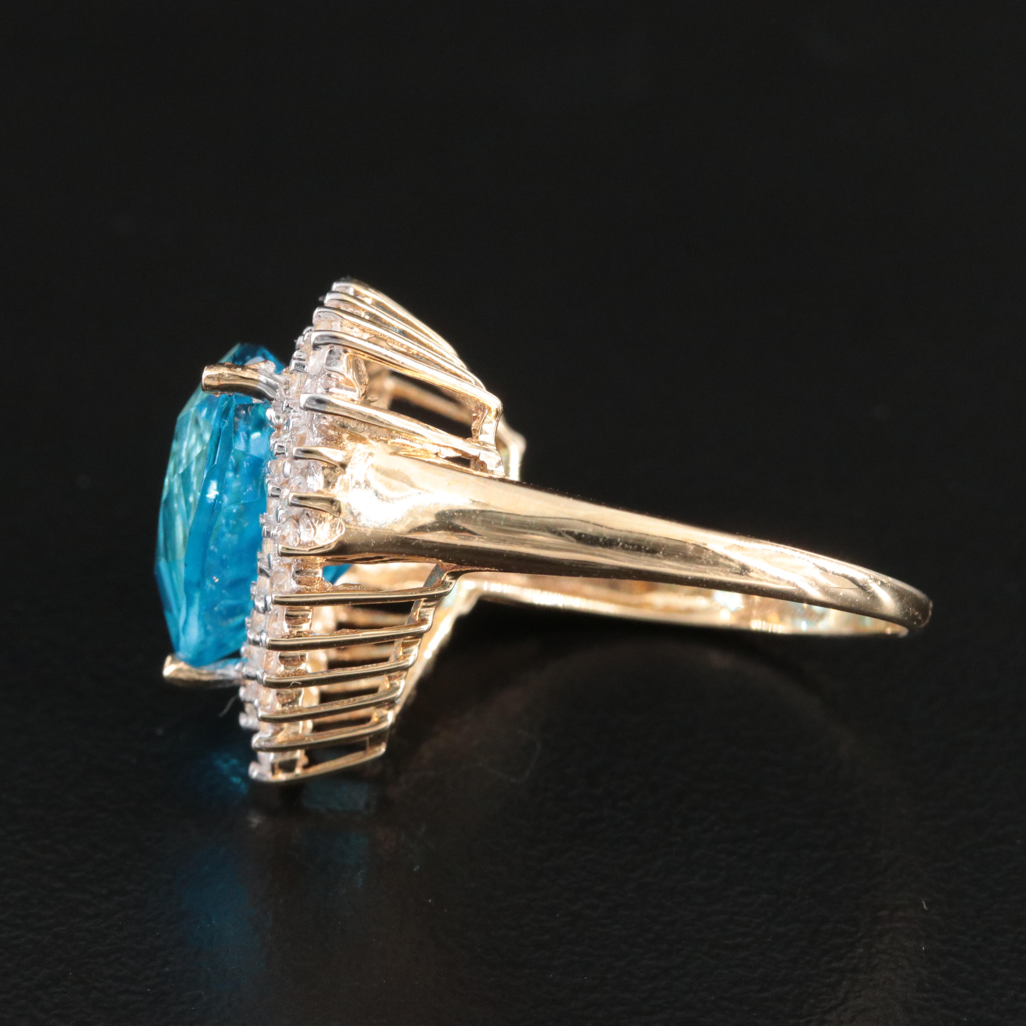 10K Blue and White Topaz Double Halo Ring