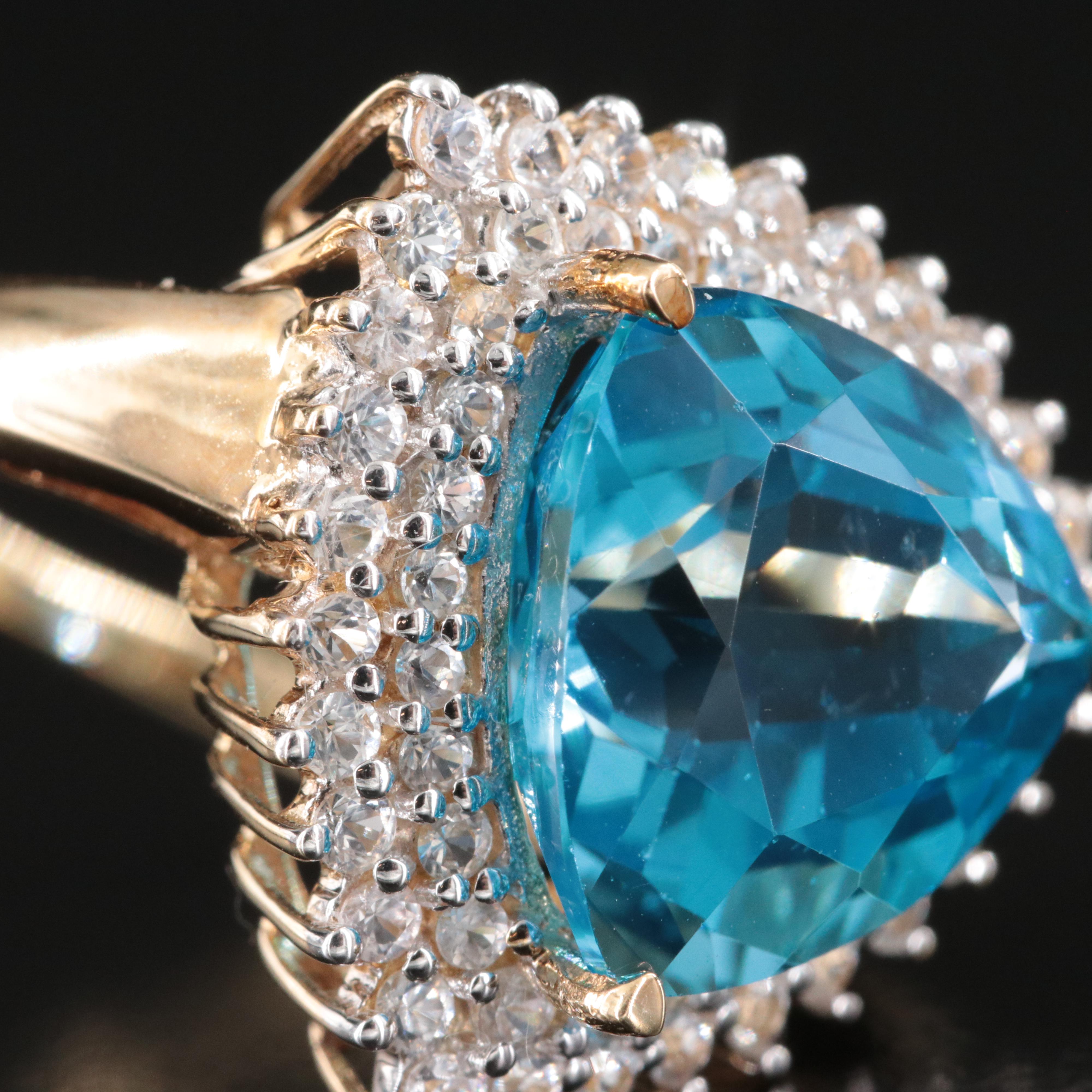 10K Blue and White Topaz Double Halo Ring