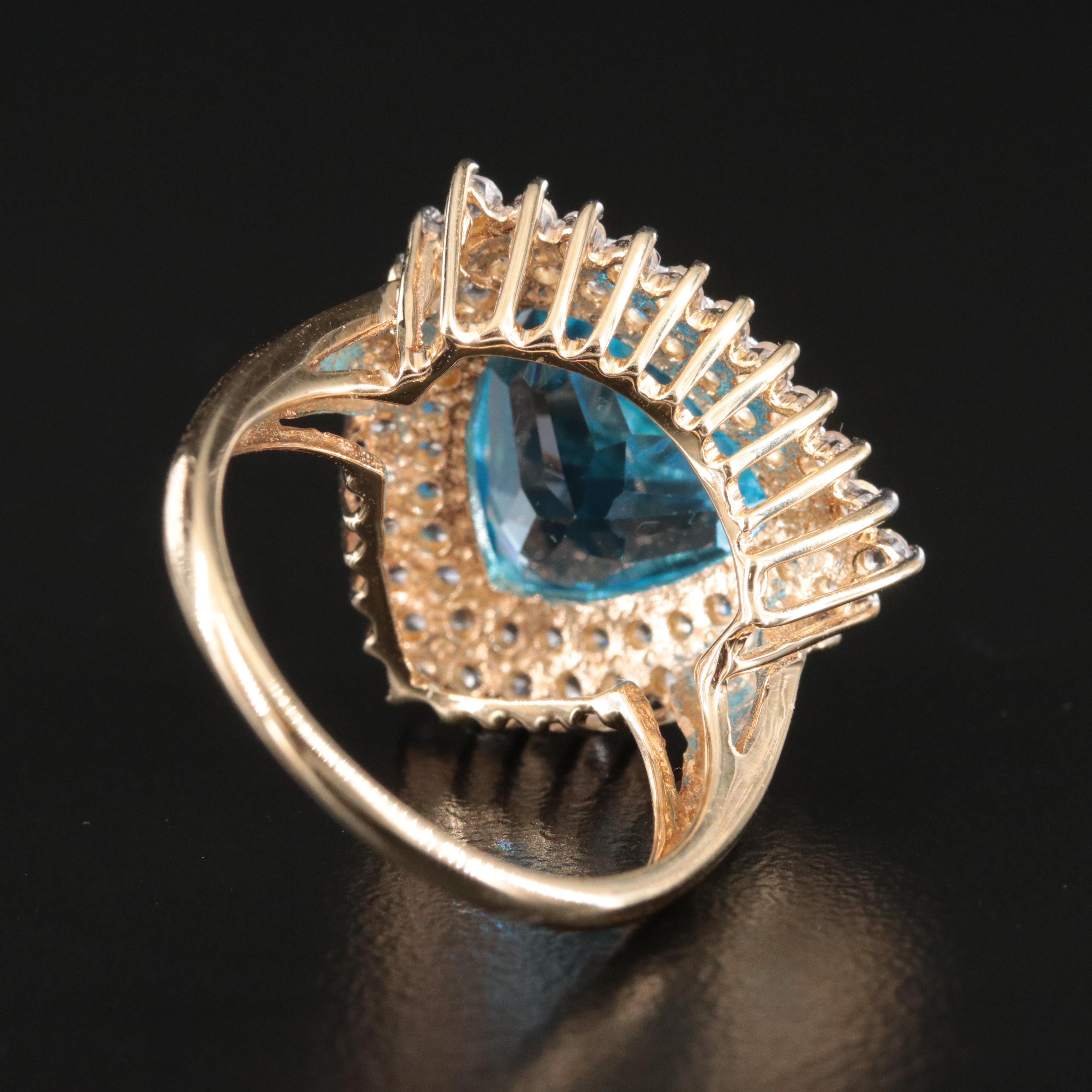 10K Blue and White Topaz Double Halo Ring