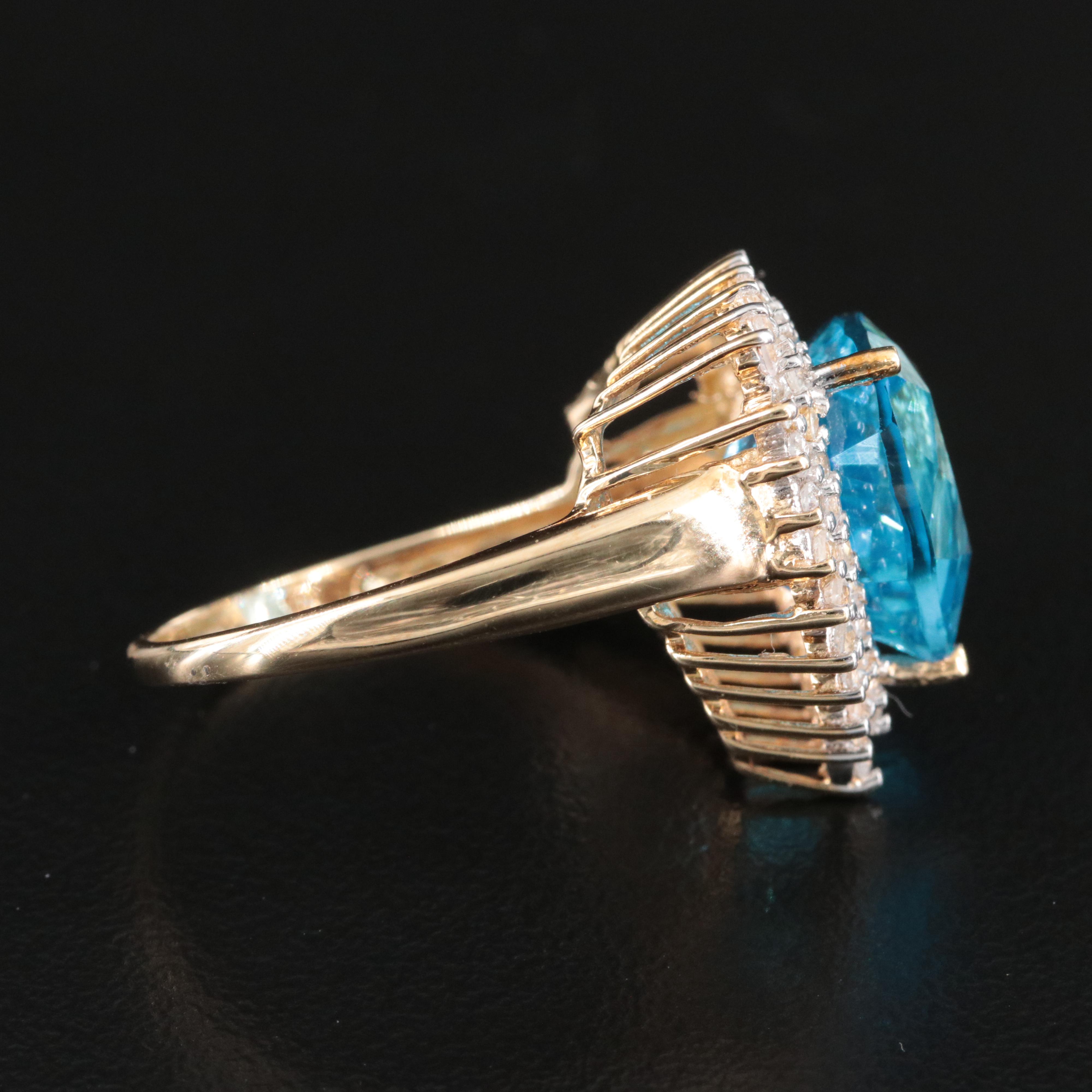 10K Blue and White Topaz Double Halo Ring