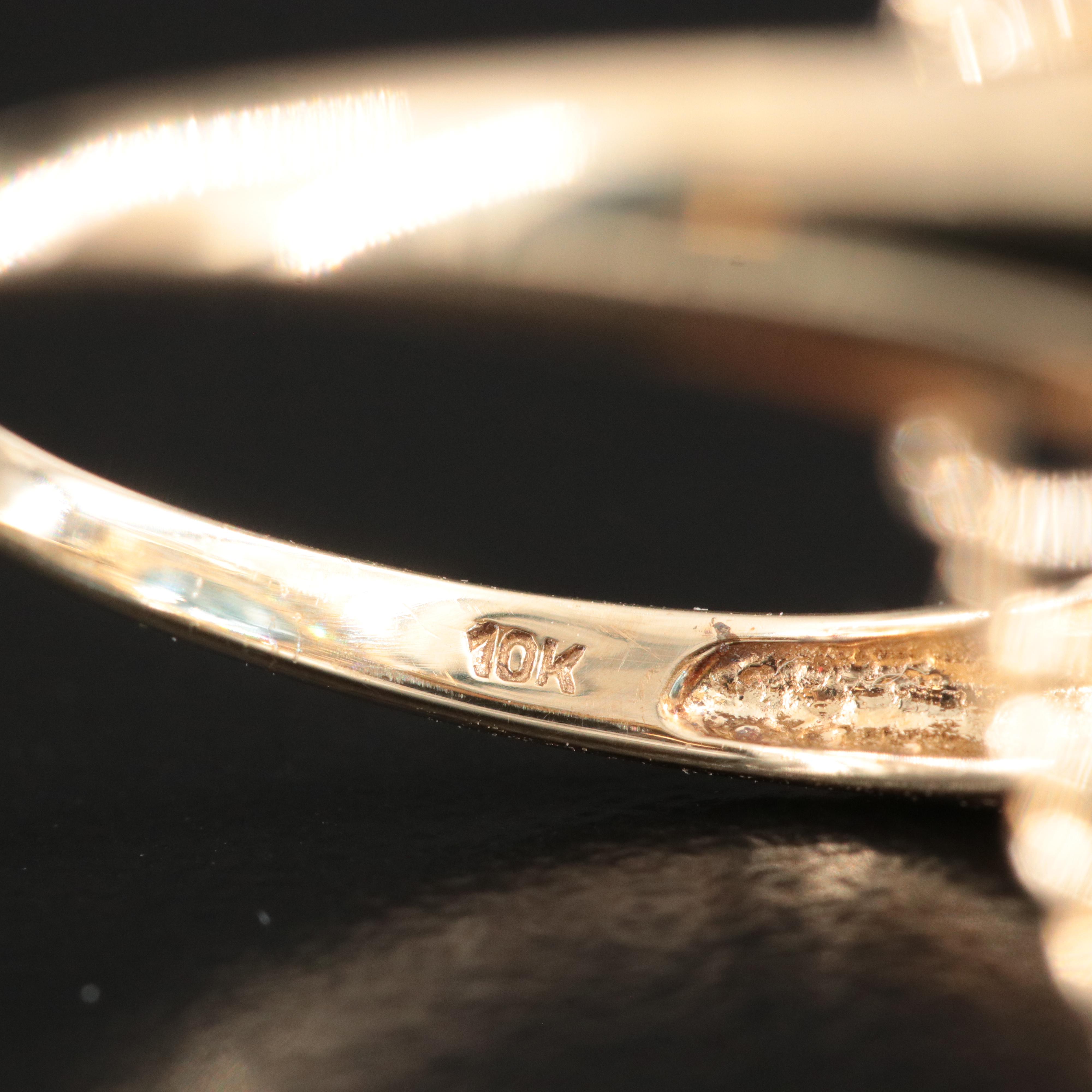 10K Blue and White Topaz Double Halo Ring