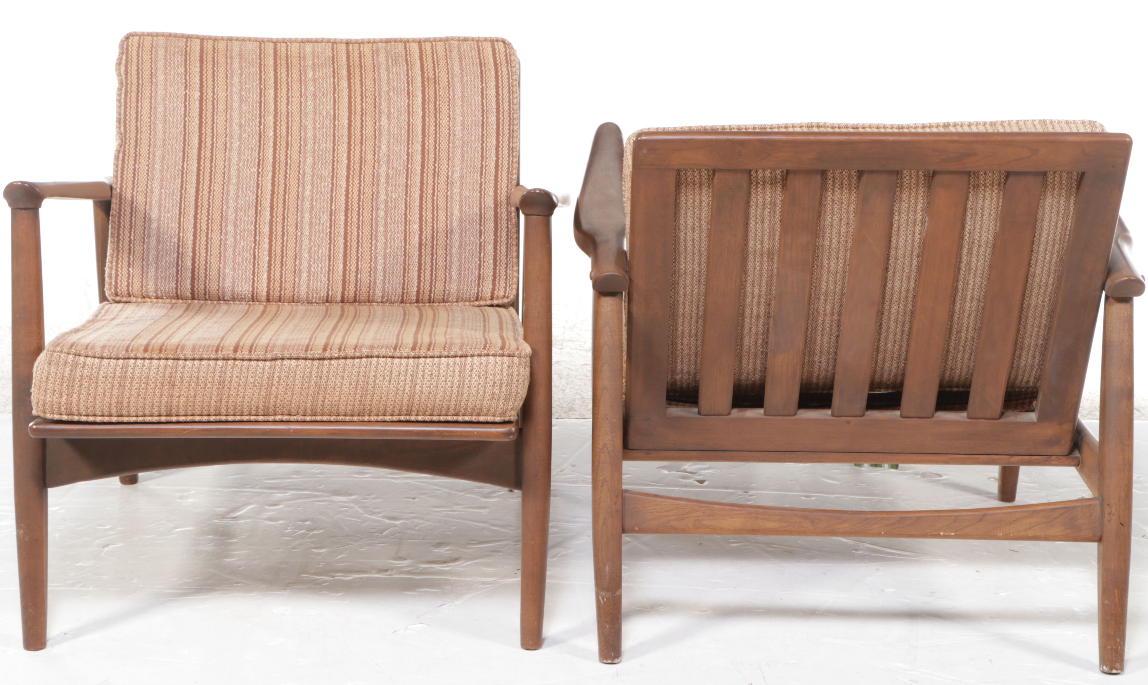 Pair of Mid Century Modern Walnut Lounge Chairs with Fabric Cushions