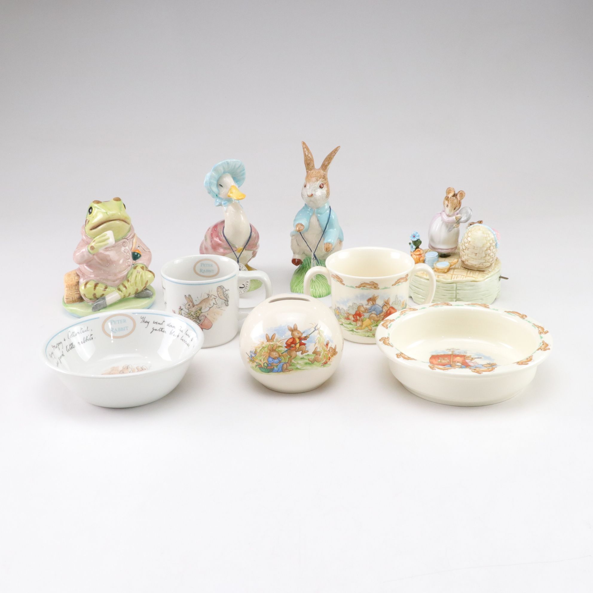 Royal Doulton "Bunnykins" Mug and Bowls with Music Box & Peter Rabbit Figurines