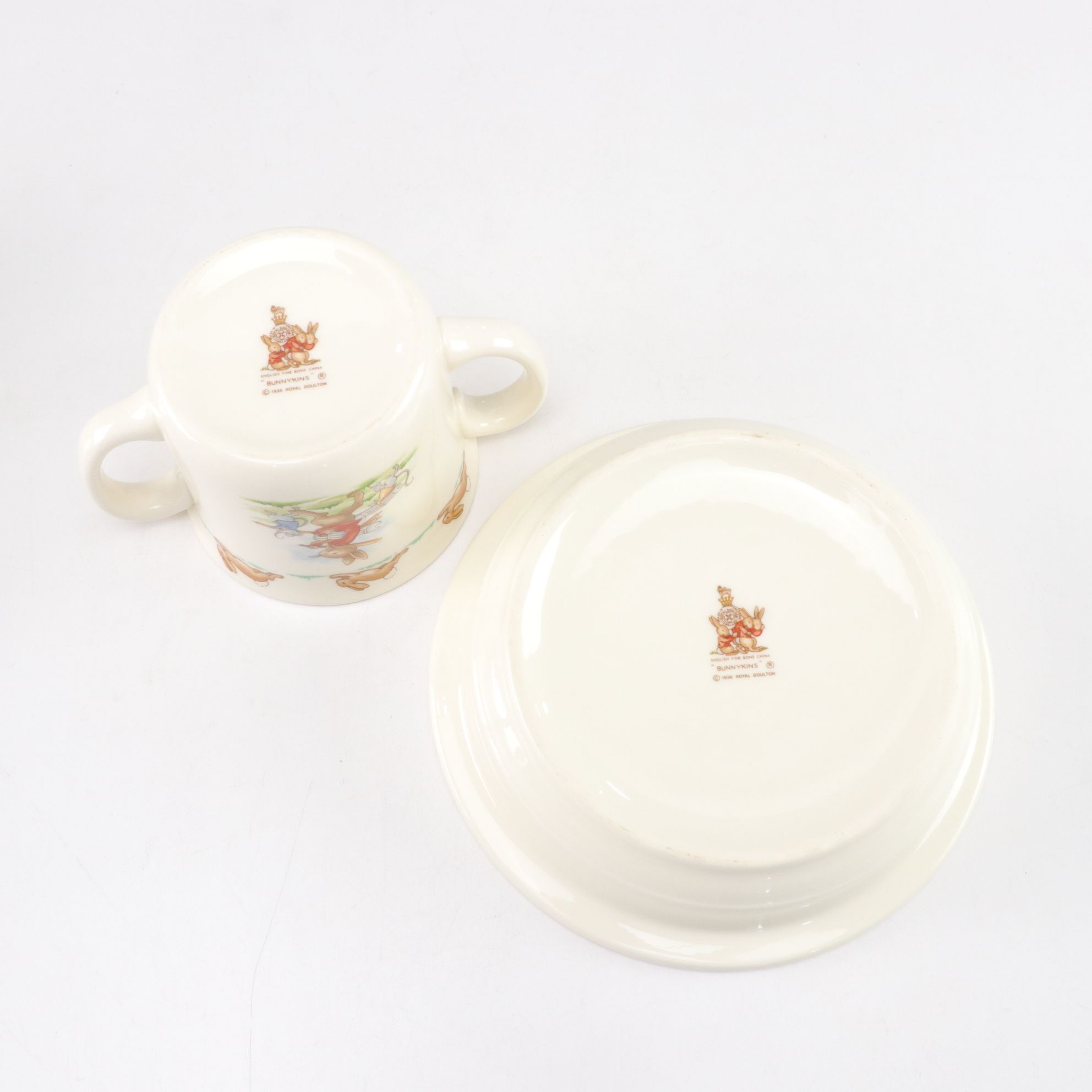 Royal Doulton "Bunnykins" Mug and Bowls with Music Box & Peter Rabbit Figurines
