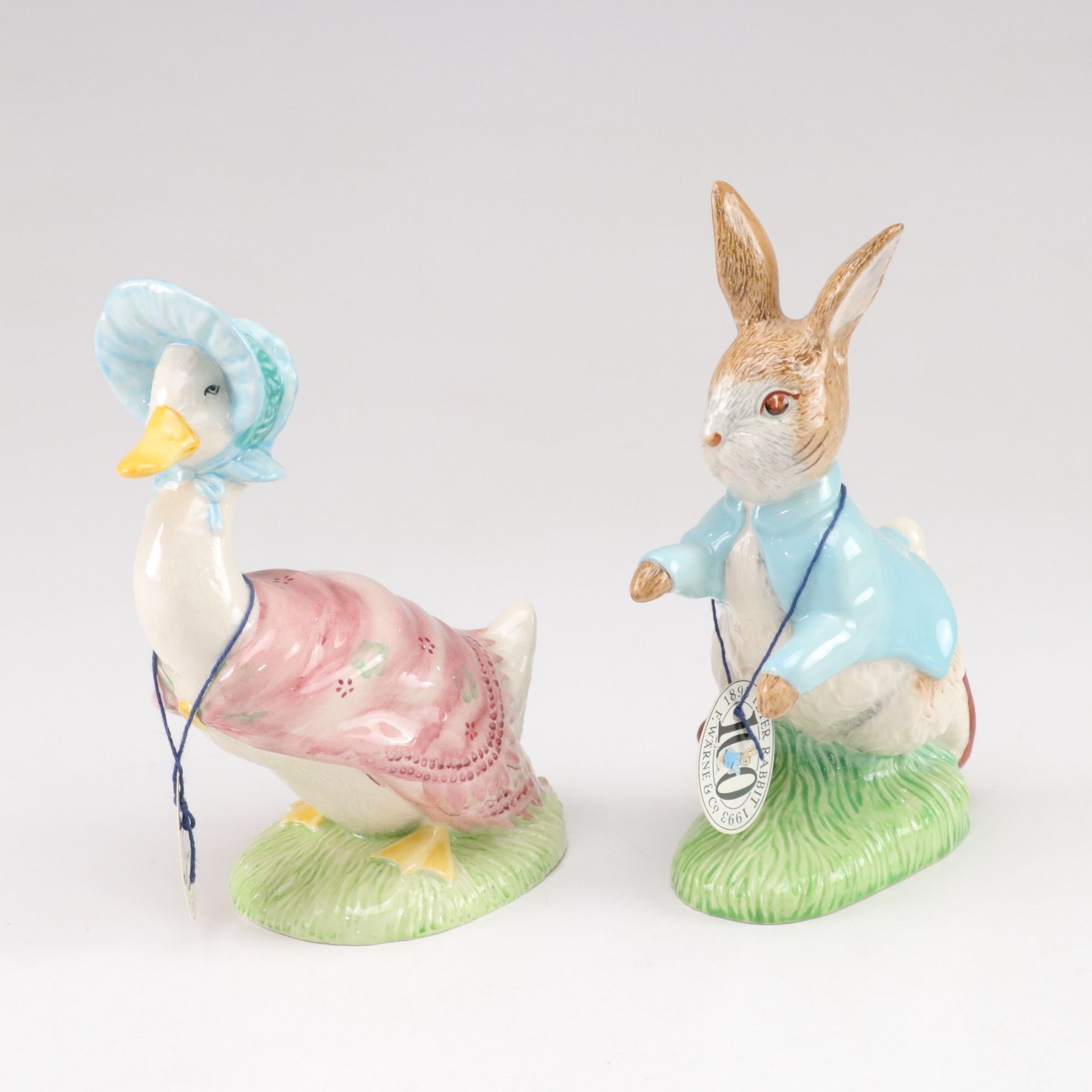 Royal Doulton "Bunnykins" Mug and Bowls with Music Box & Peter Rabbit Figurines