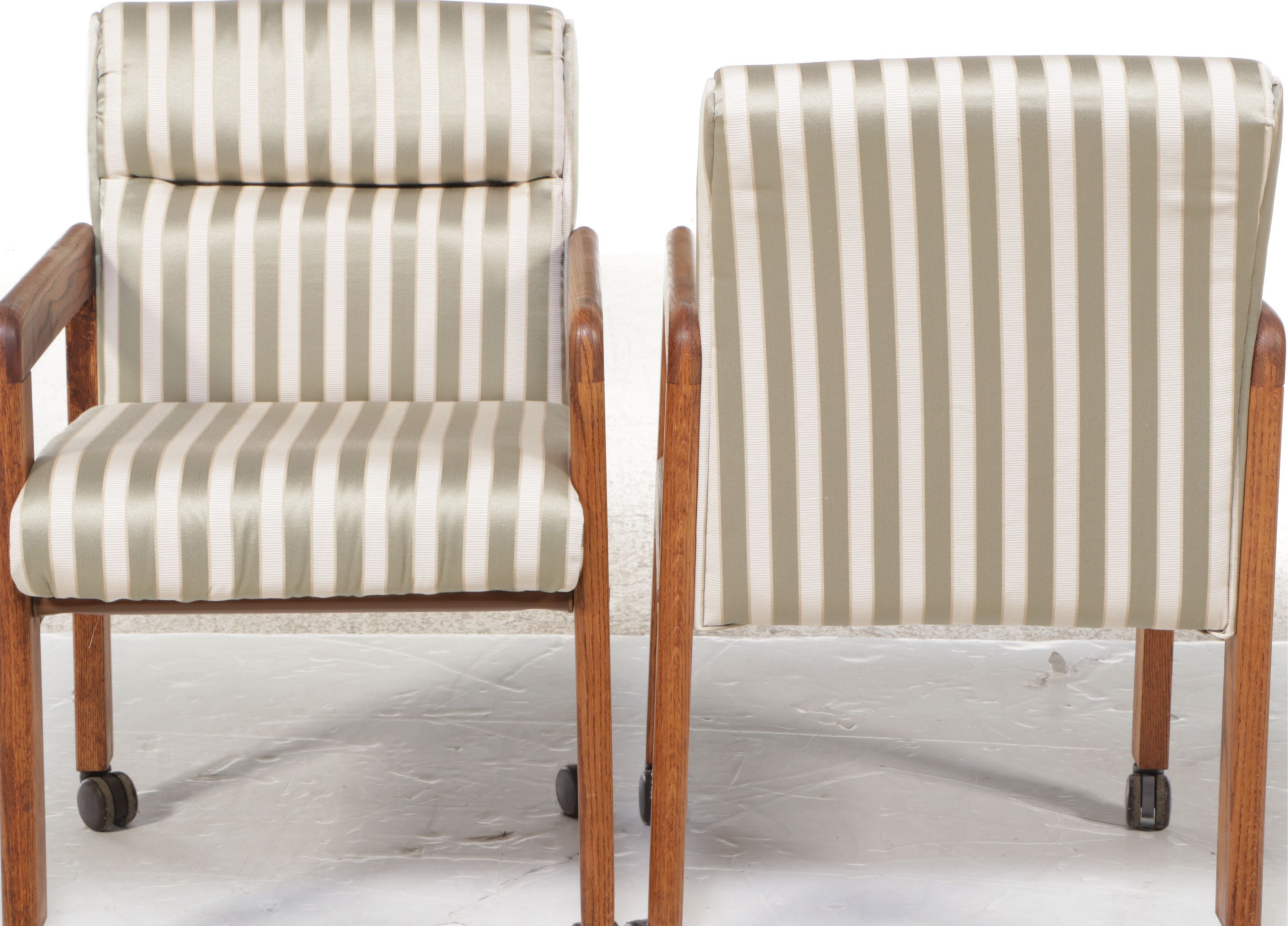 Pair of Mid Century Style Striped Upholstered Armchairs on Casters