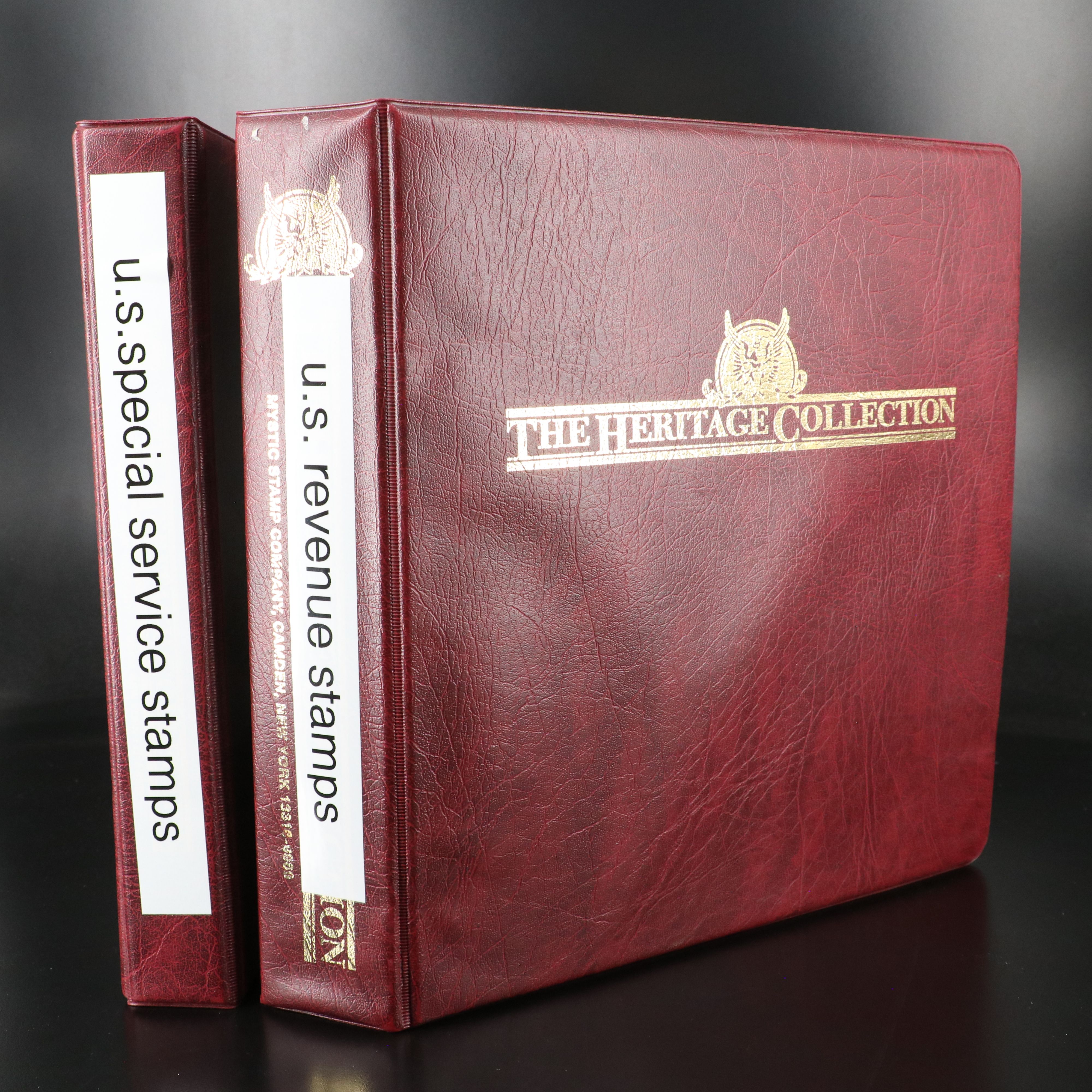 Two Stamp Albums With Revenue and Special Service Stamps