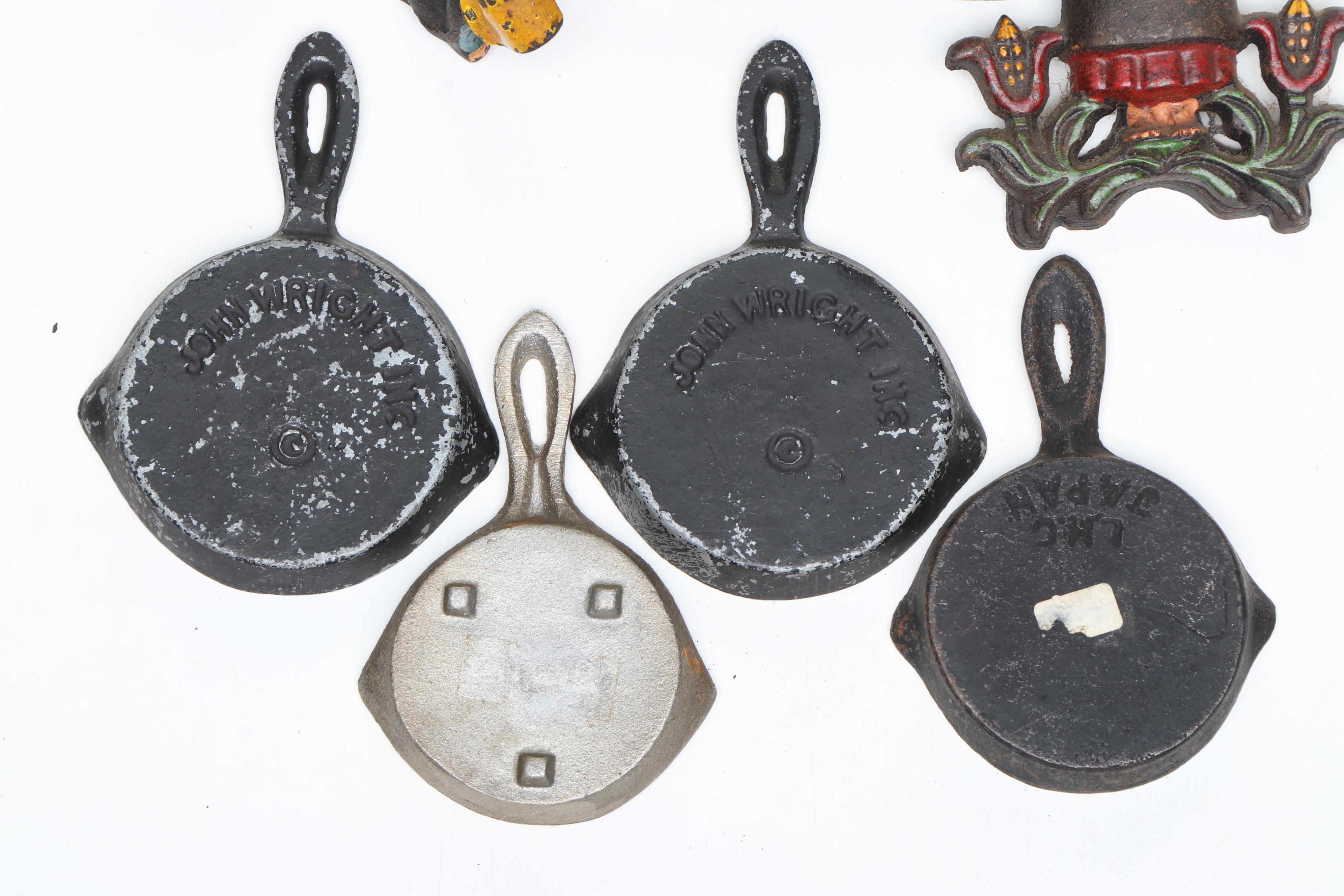 John Wright and Other Cast Iron Ashtrays with More Cast Iron Décor