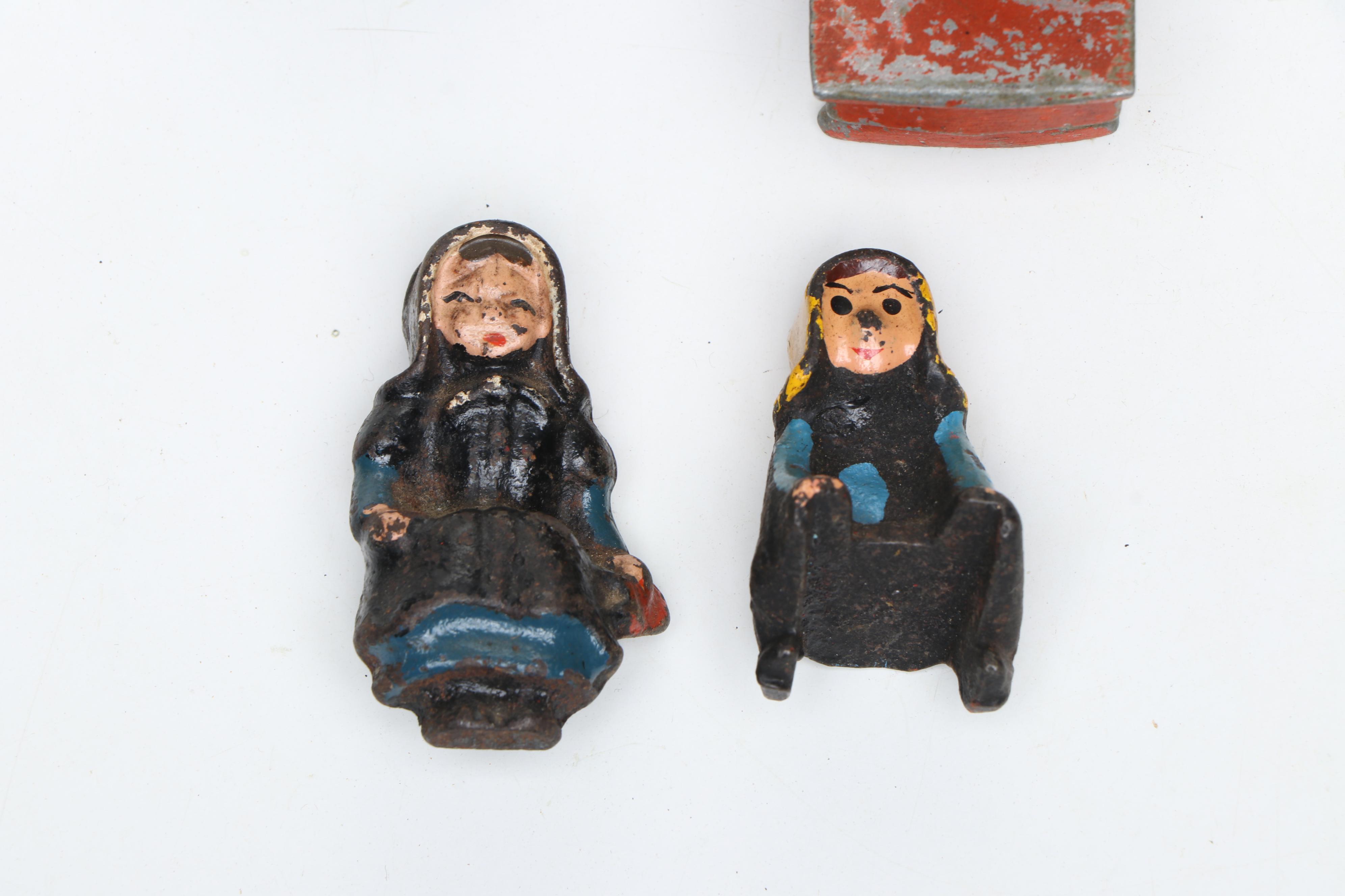 John Wright and Other Cast Iron Ashtrays with More Cast Iron Décor