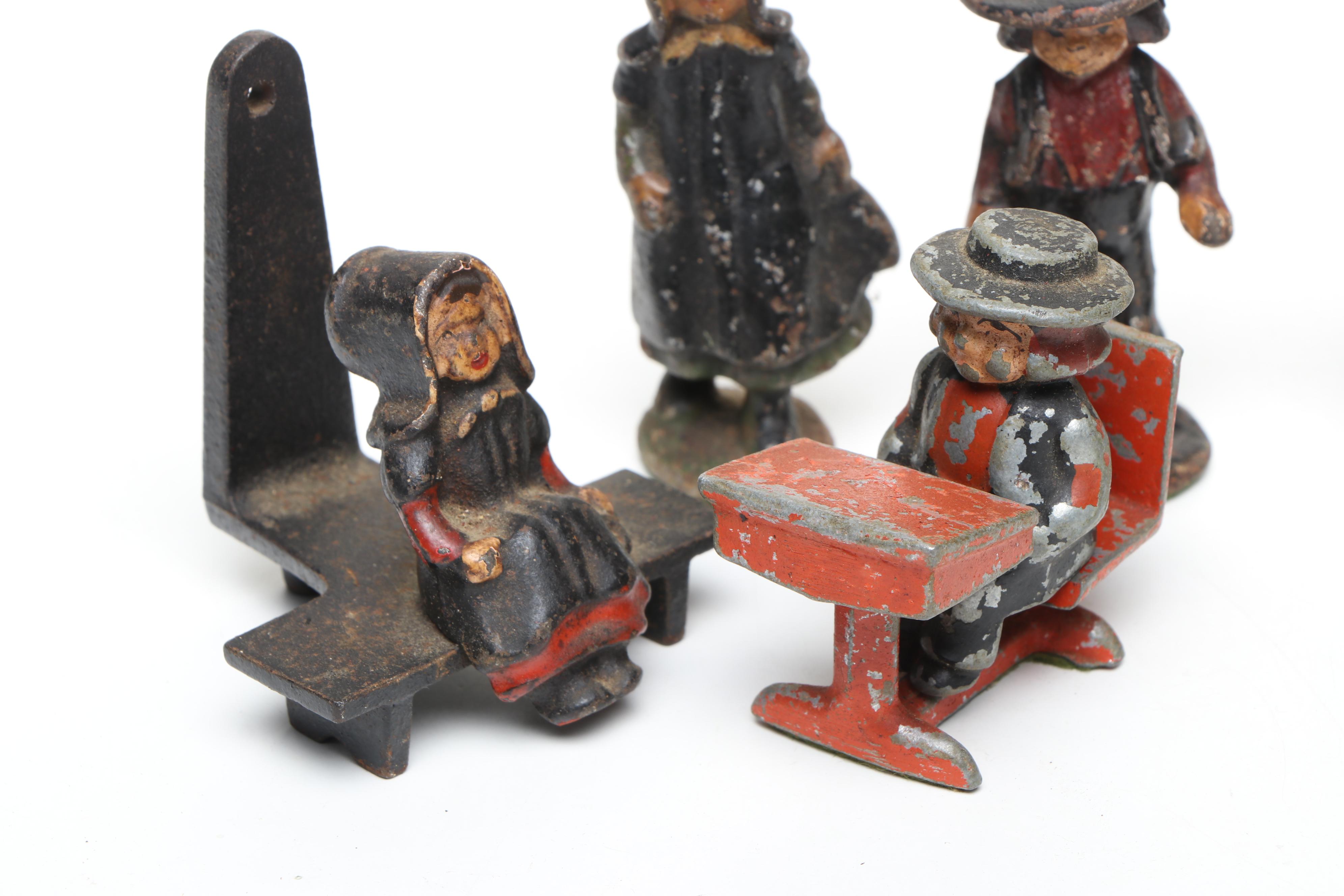 John Wright and Other Cast Iron Ashtrays with More Cast Iron Décor