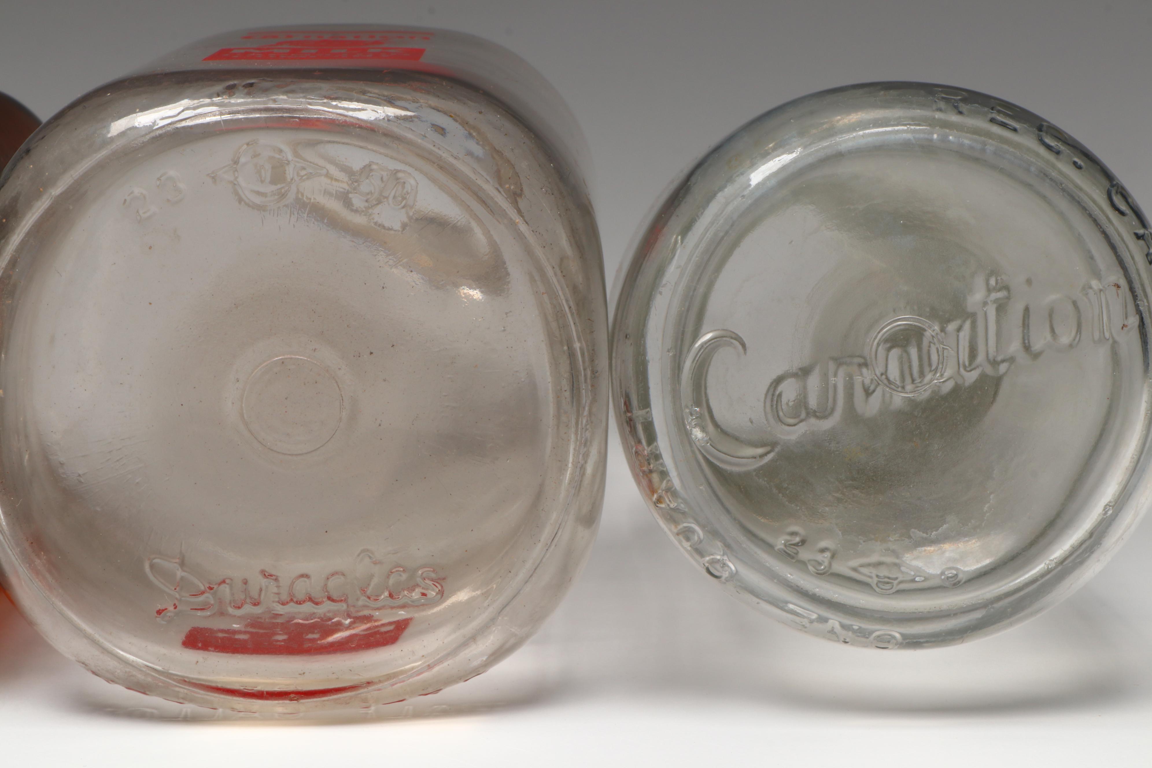 Carnation Milk and Cottage Cheese Advertising Glass Bottles, Mid-20th Century