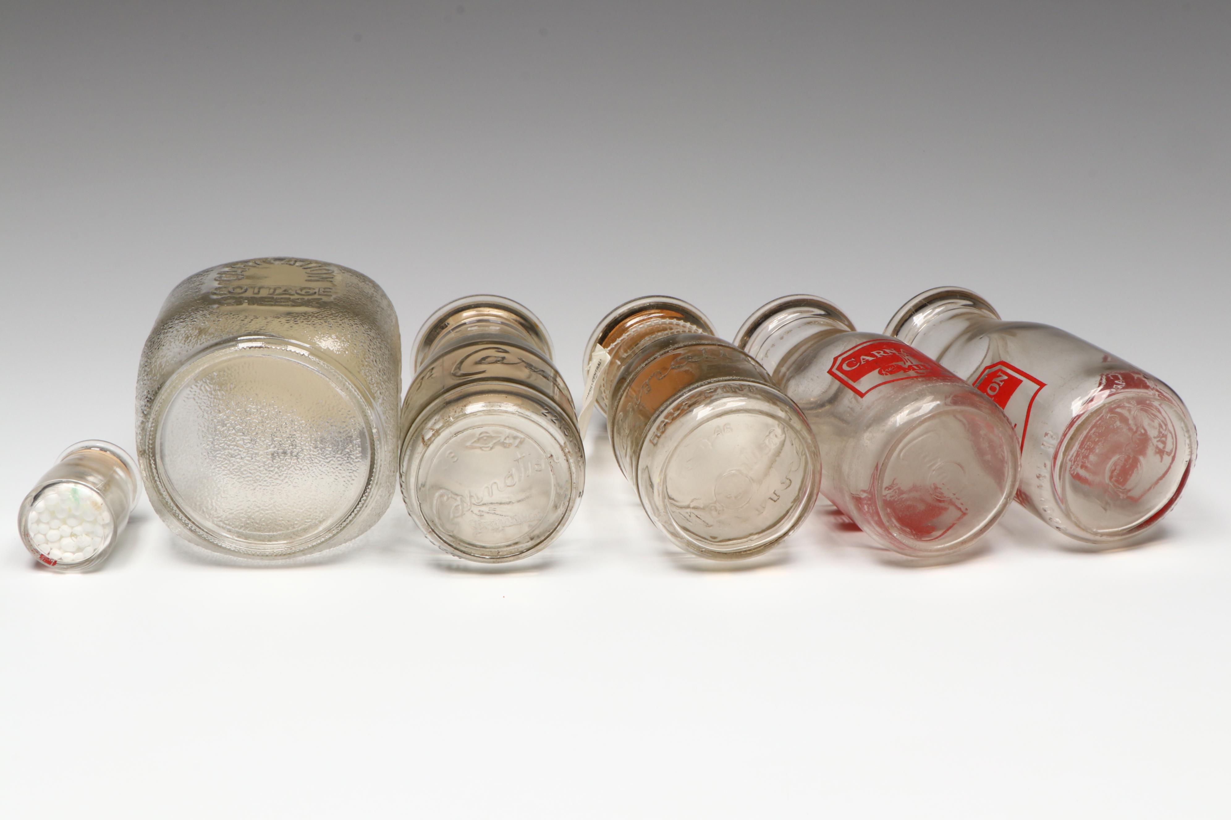 Carnation Milk and Cottage Cheese Advertising Glass Bottles, Mid-20th Century