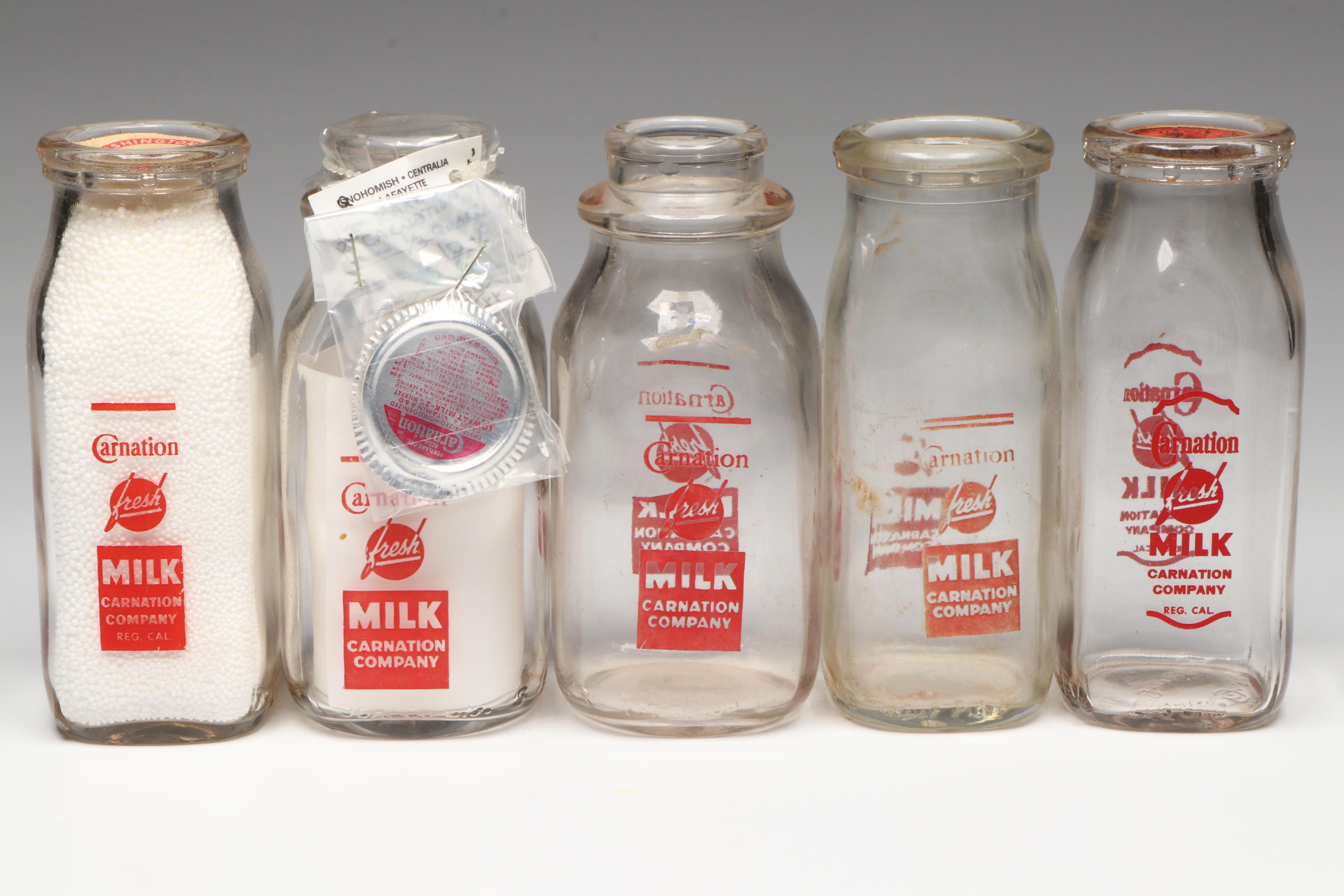Carnation Milk and Cottage Cheese Advertising Glass Bottles, Mid-20th Century