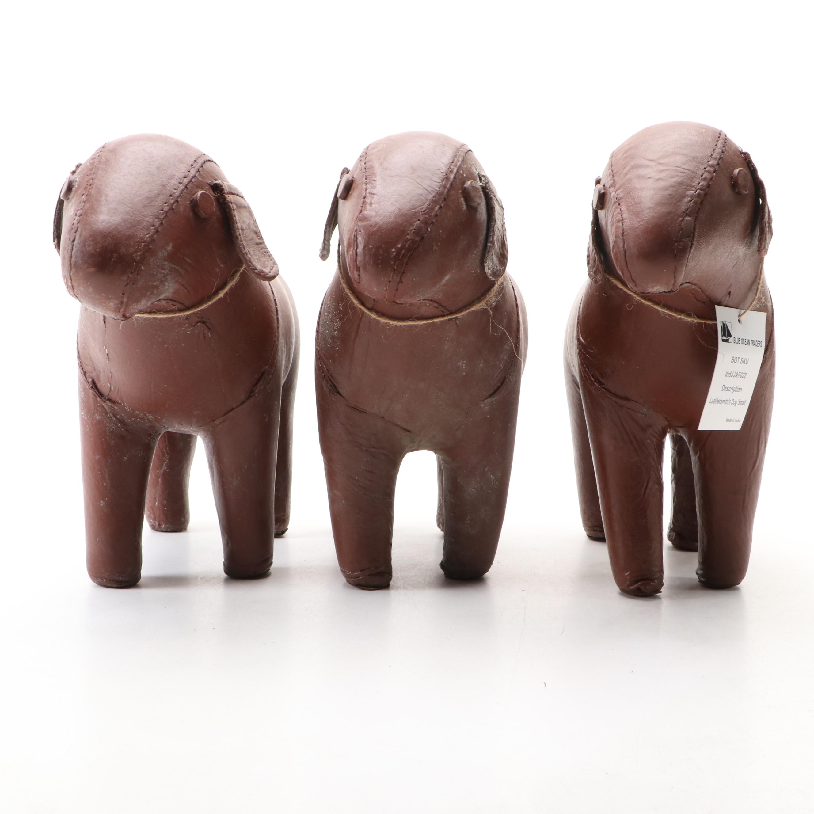 Three Stitched Brown Leather Dogs