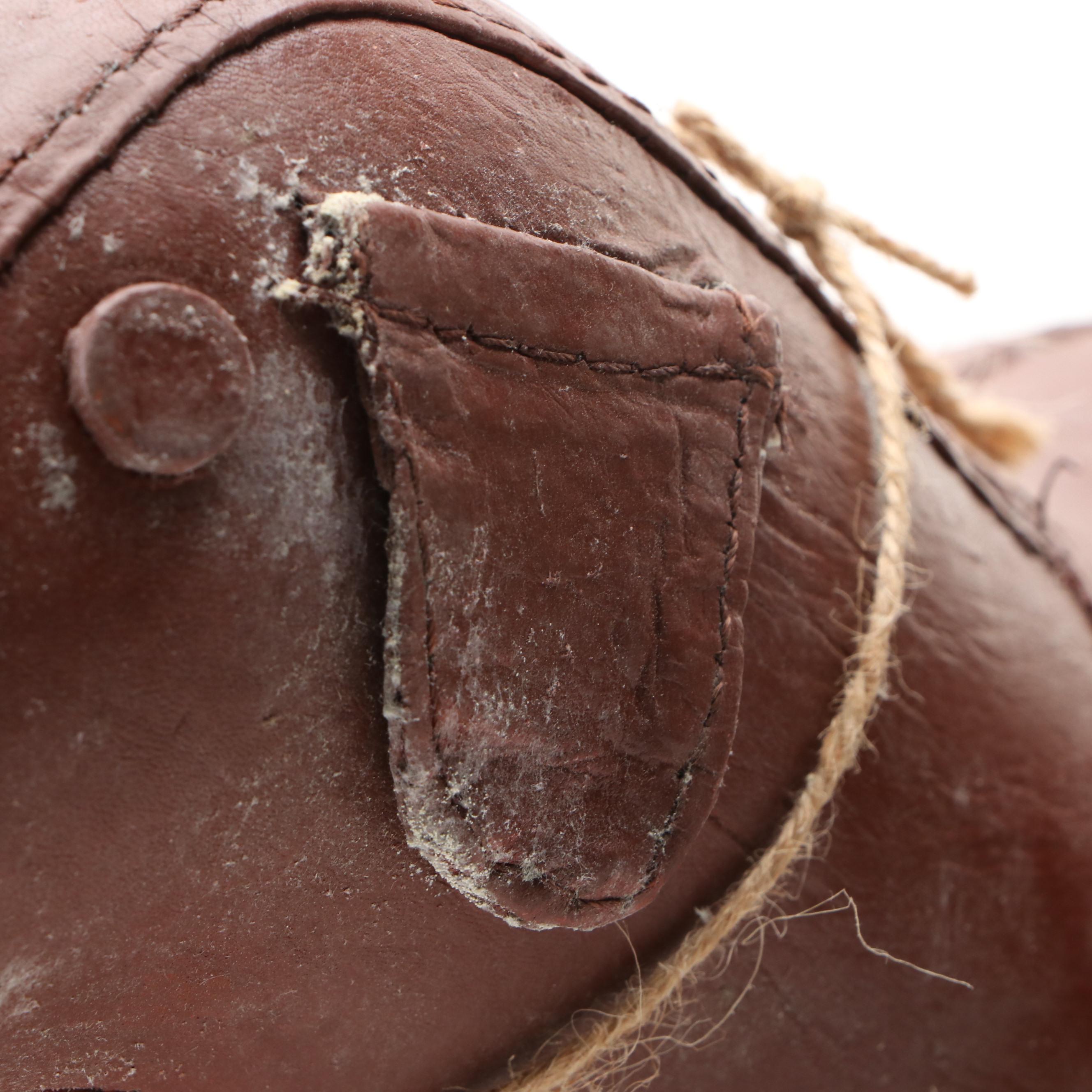 Three Stitched Brown Leather Dogs