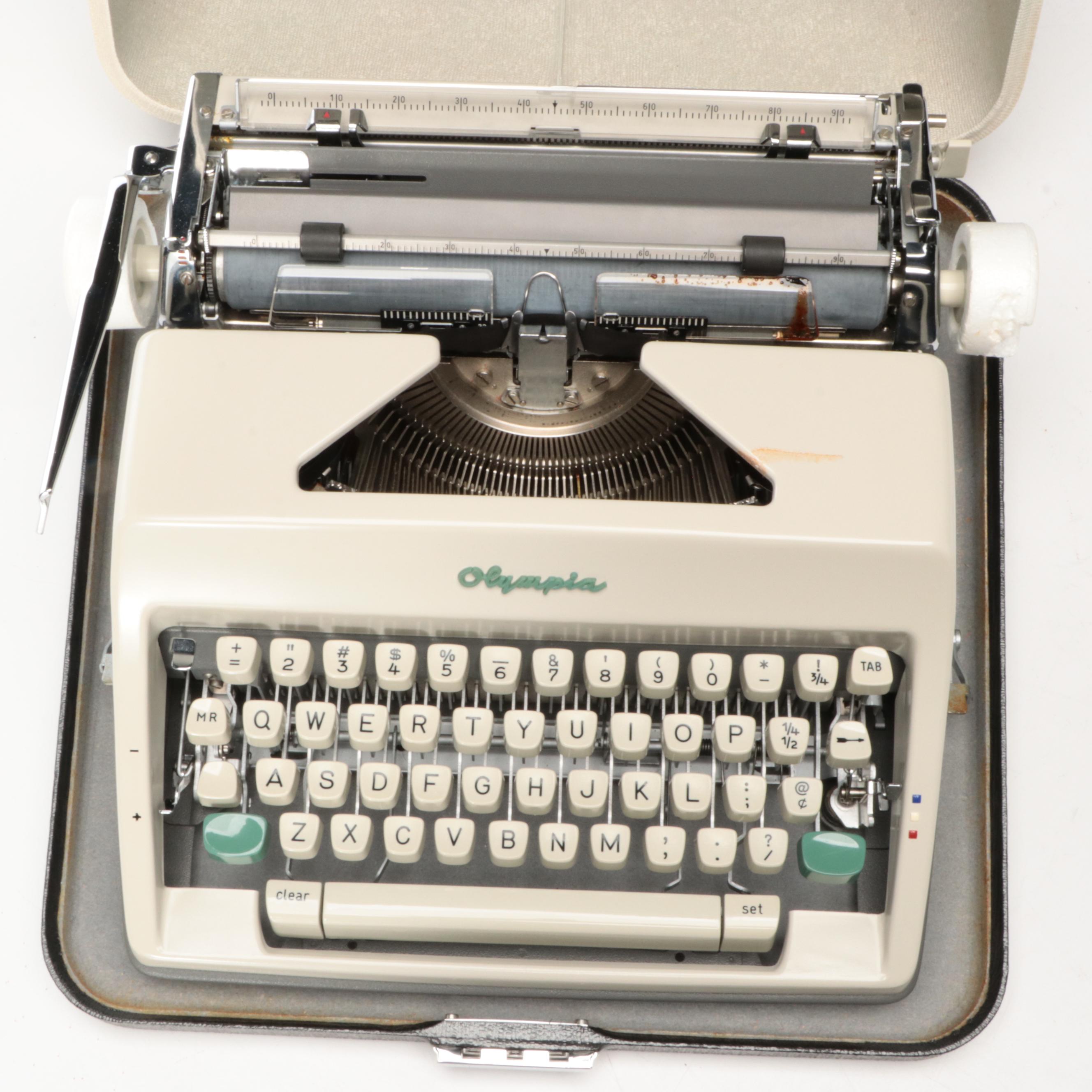 Olympia SM9 Manual Portable Typewriter with Carrying Case, 1970s