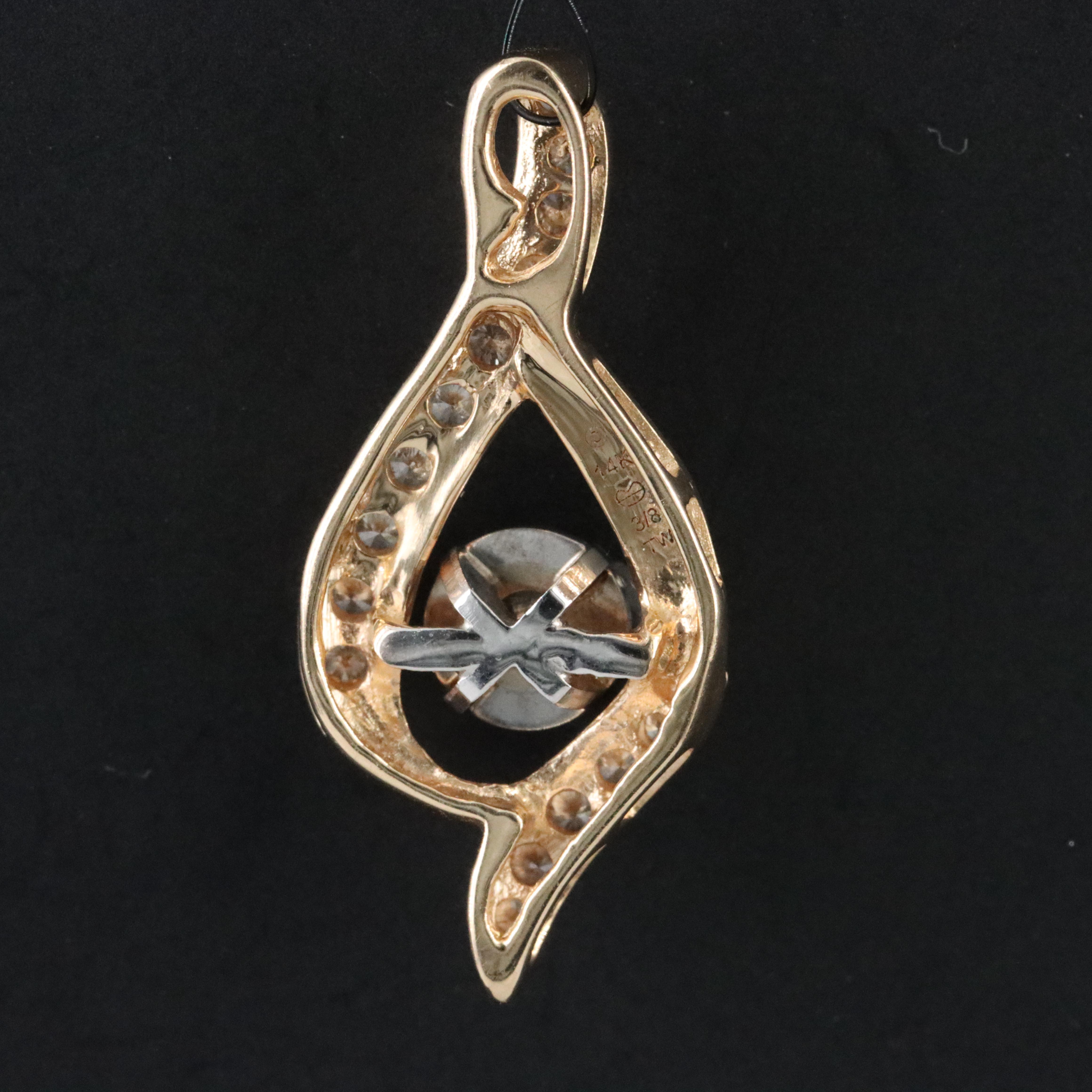 14K 0.47 CTW Diamond Pendant