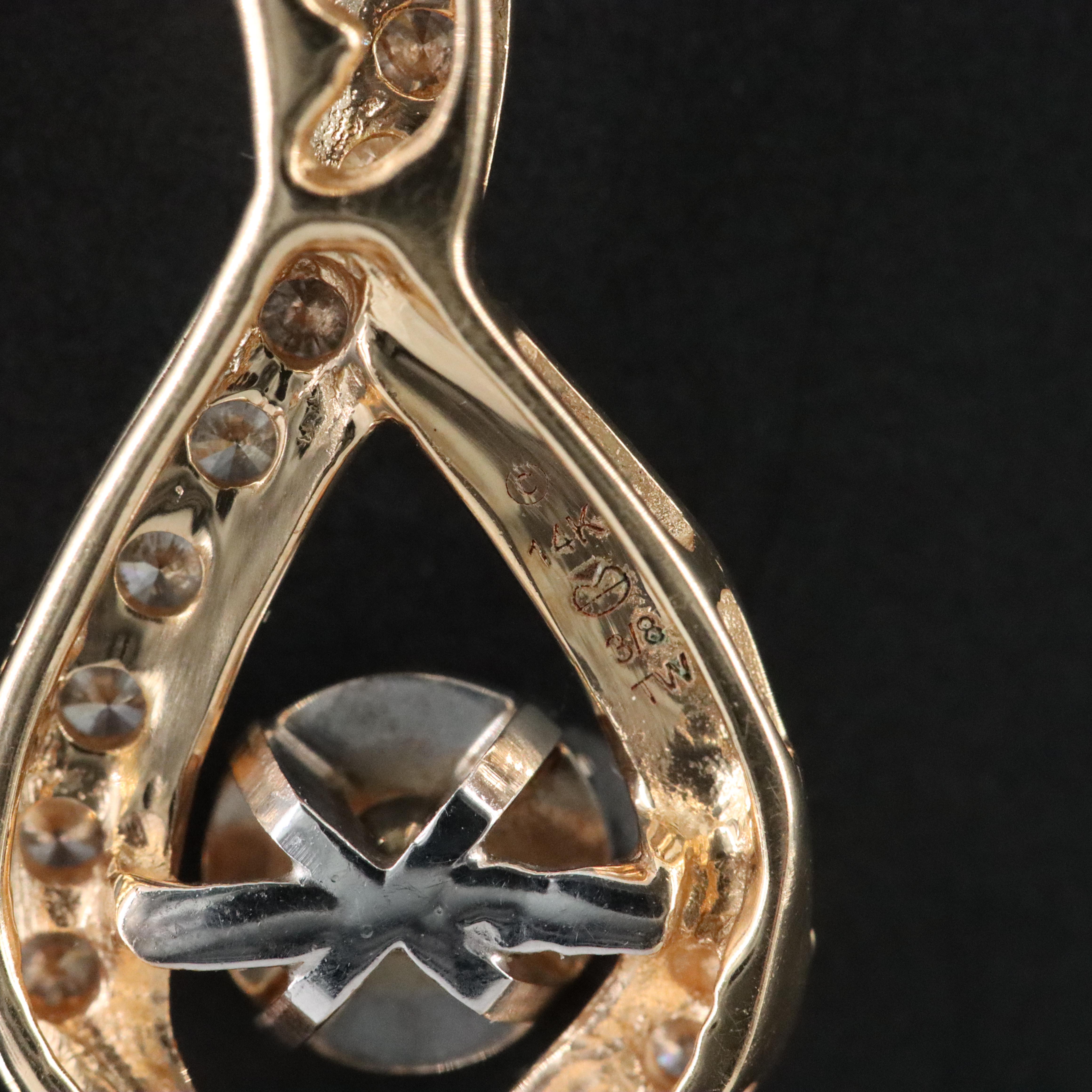 14K 0.47 CTW Diamond Pendant