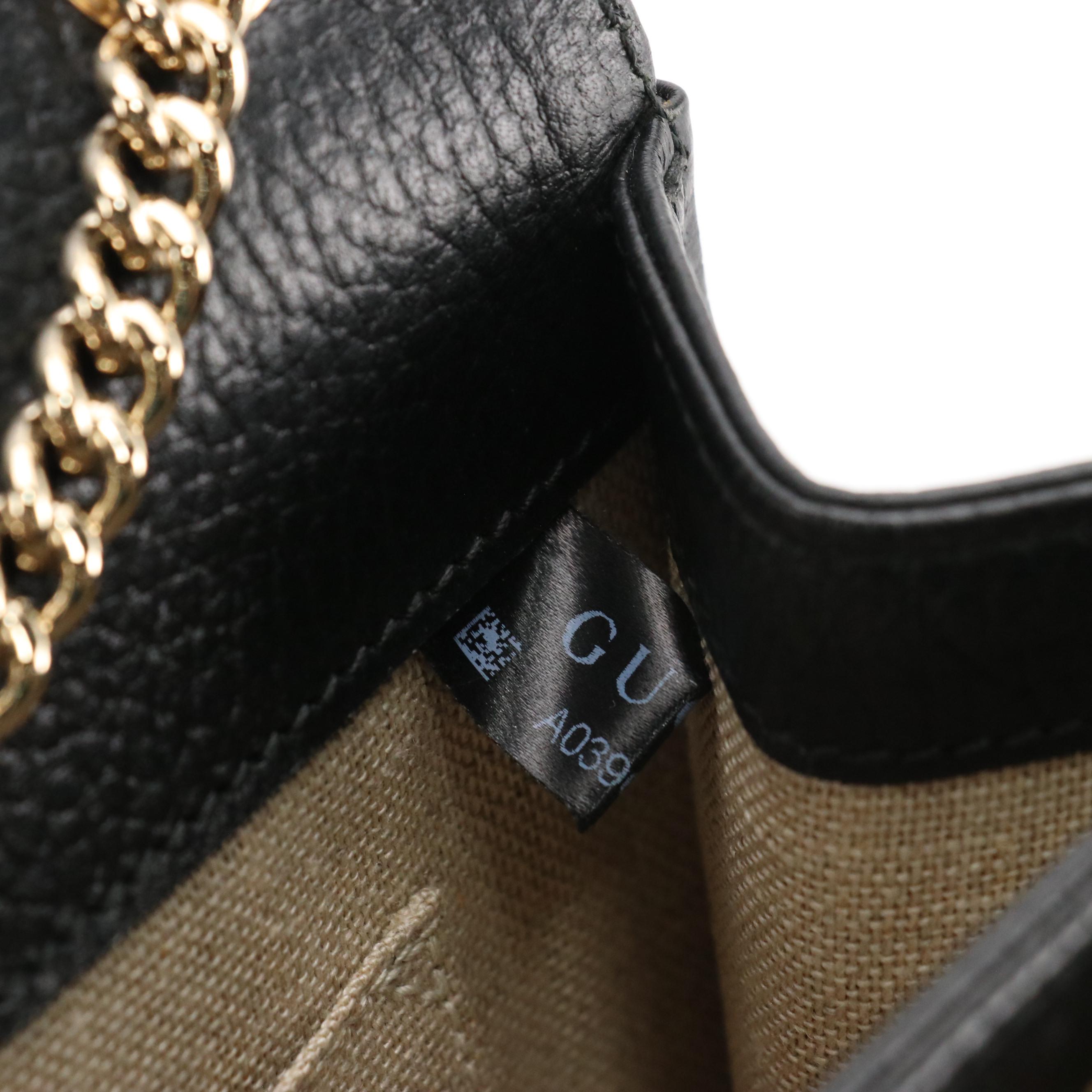 Gucci Interlocking GG Dollar Crossbody Bag in Black Grained Leather