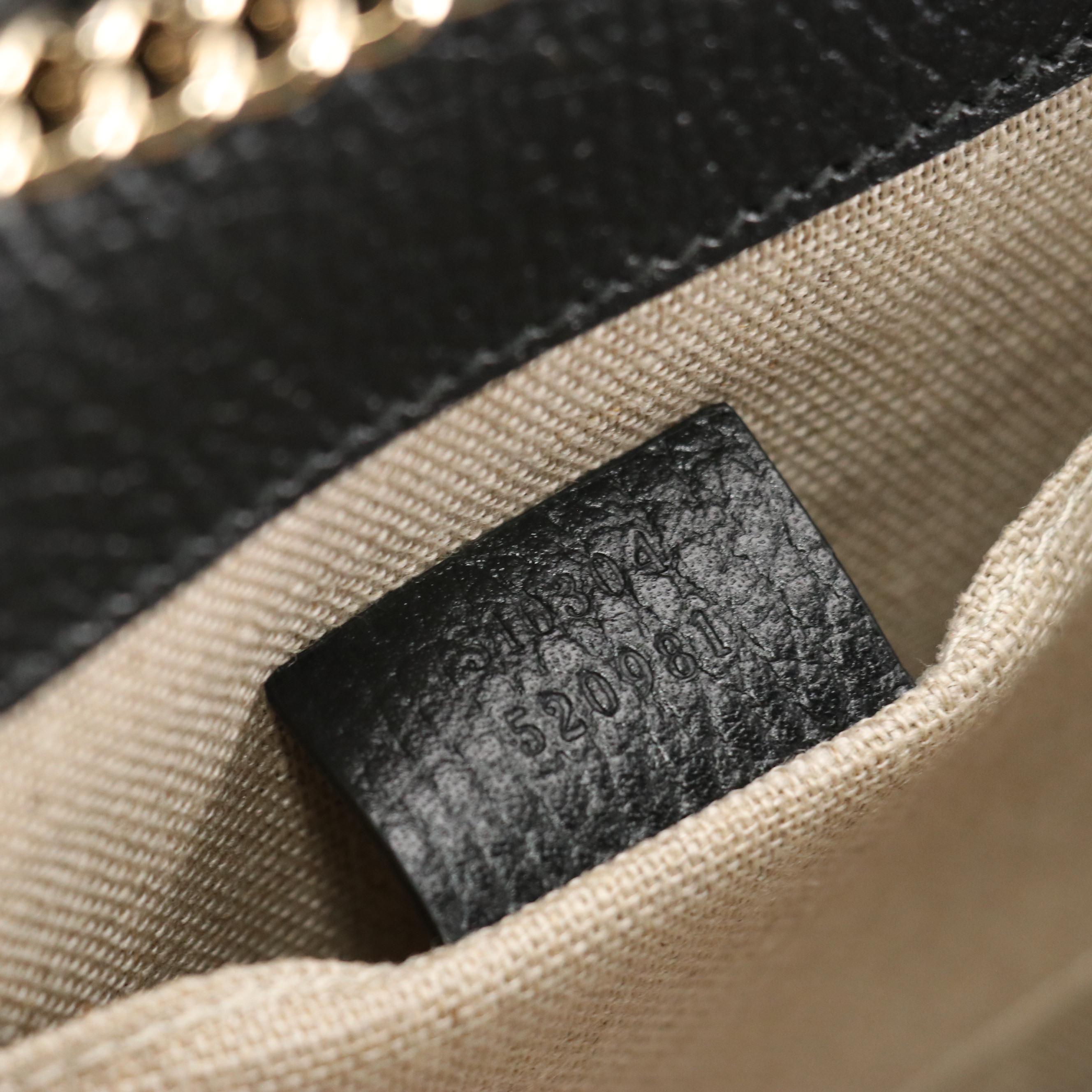 Gucci Interlocking GG Dollar Crossbody Bag in Black Grained Leather