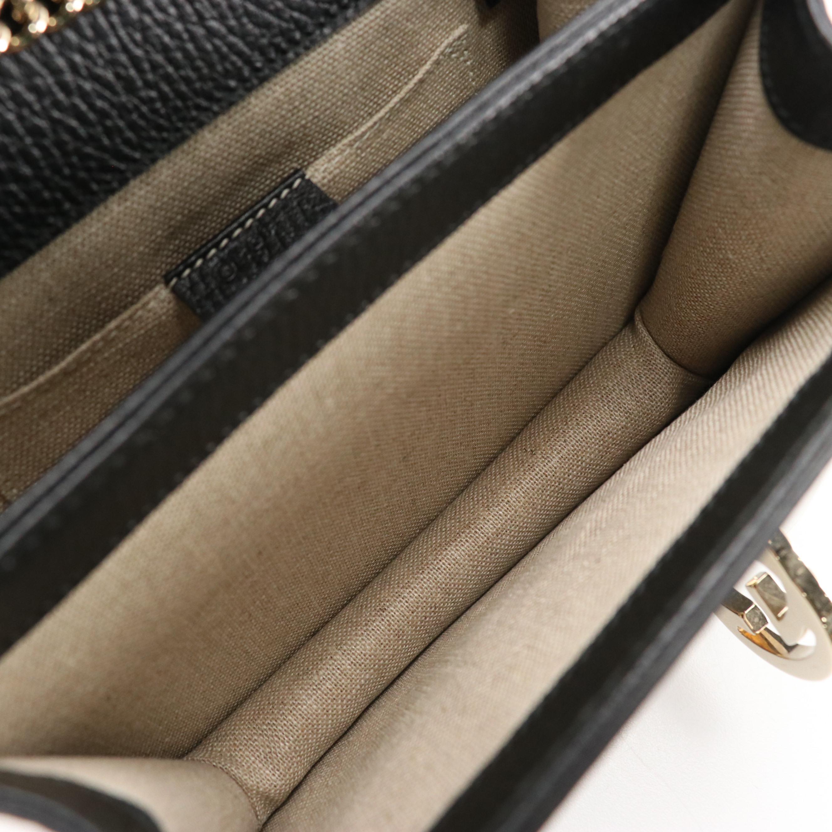 Gucci Interlocking GG Dollar Crossbody Bag in Black Grained Leather