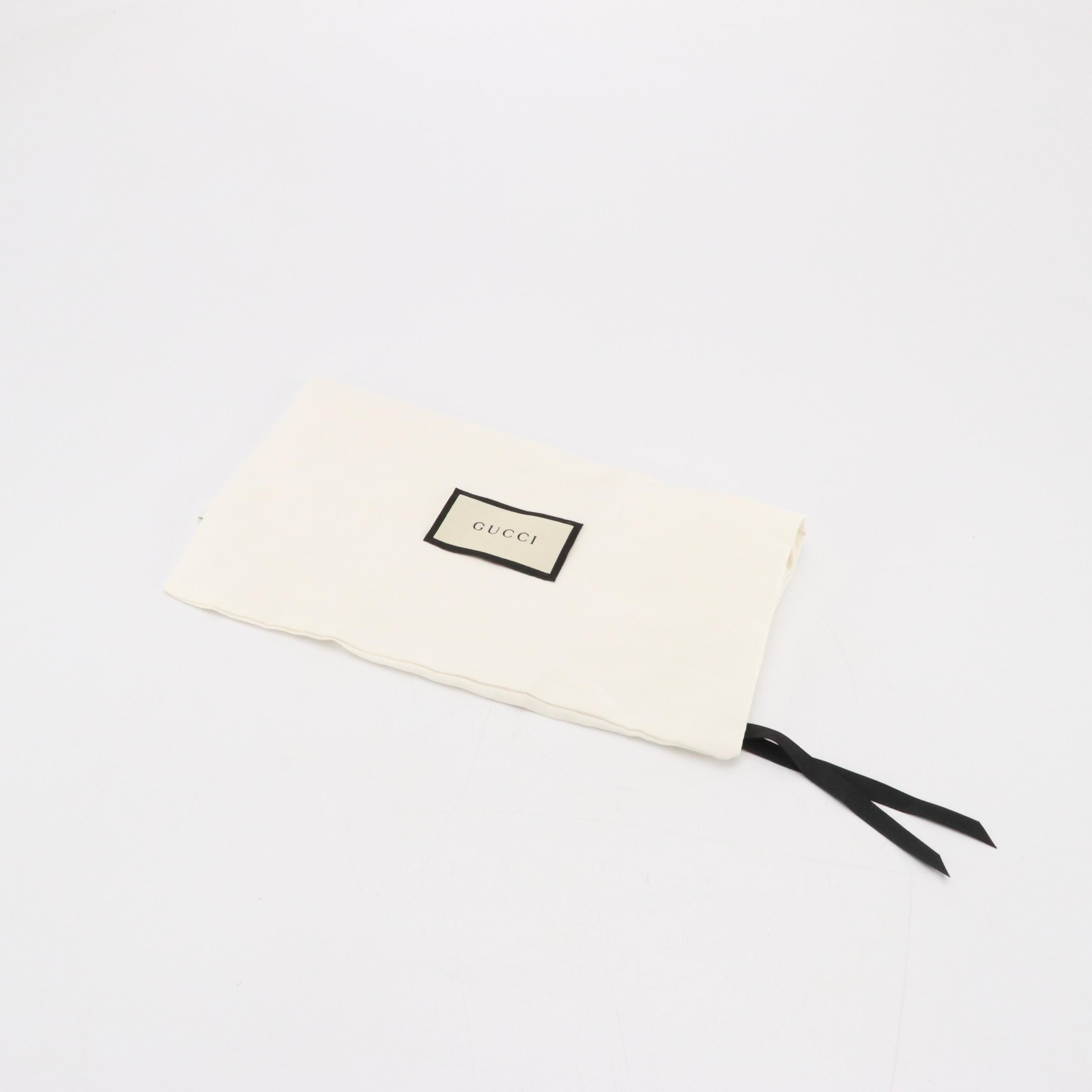 Gucci Interlocking GG Dollar Crossbody Bag in Black Grained Leather