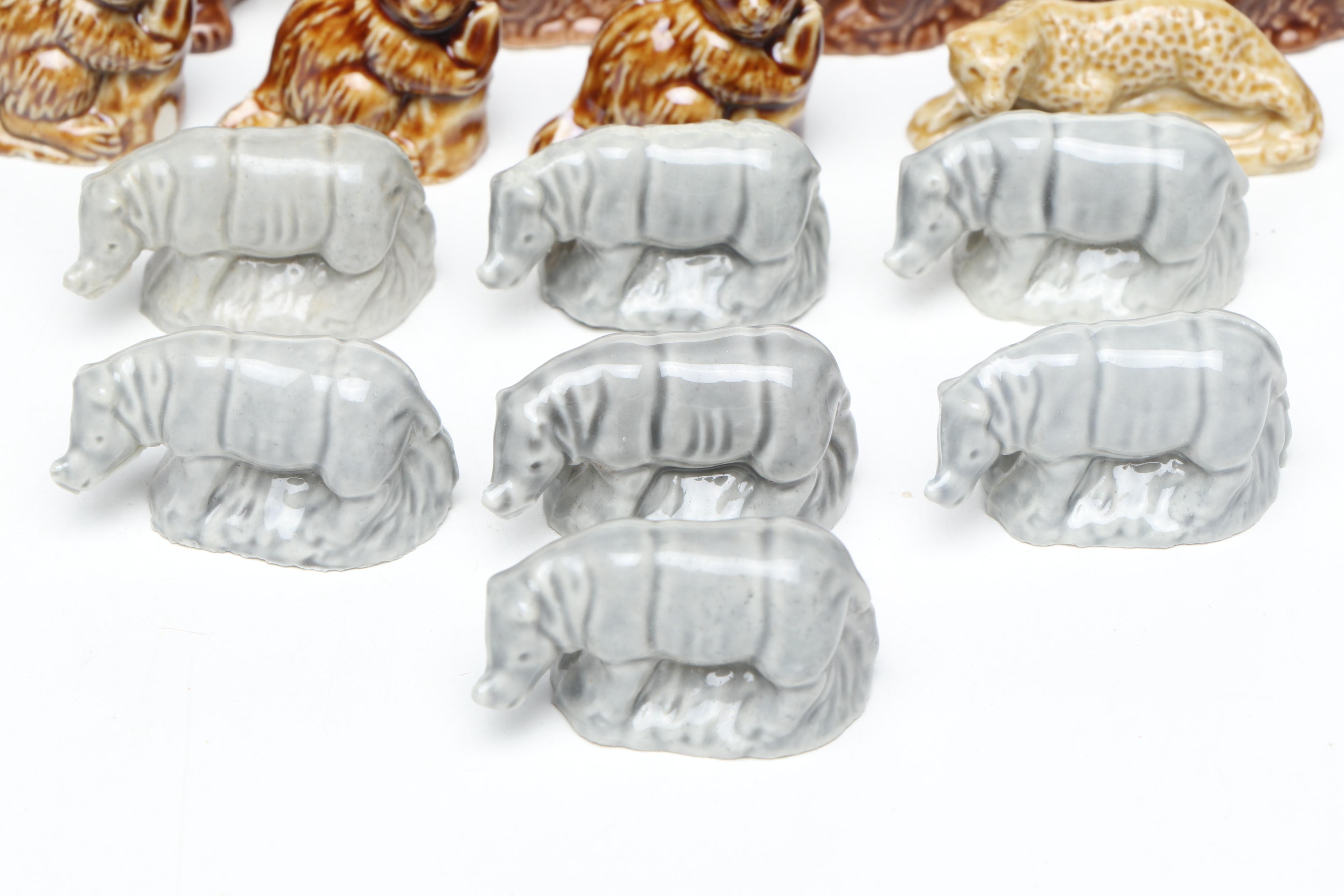 Animal Ceramic Figurines Featuring Raccoons, Rhinoceroses, and Giraffes