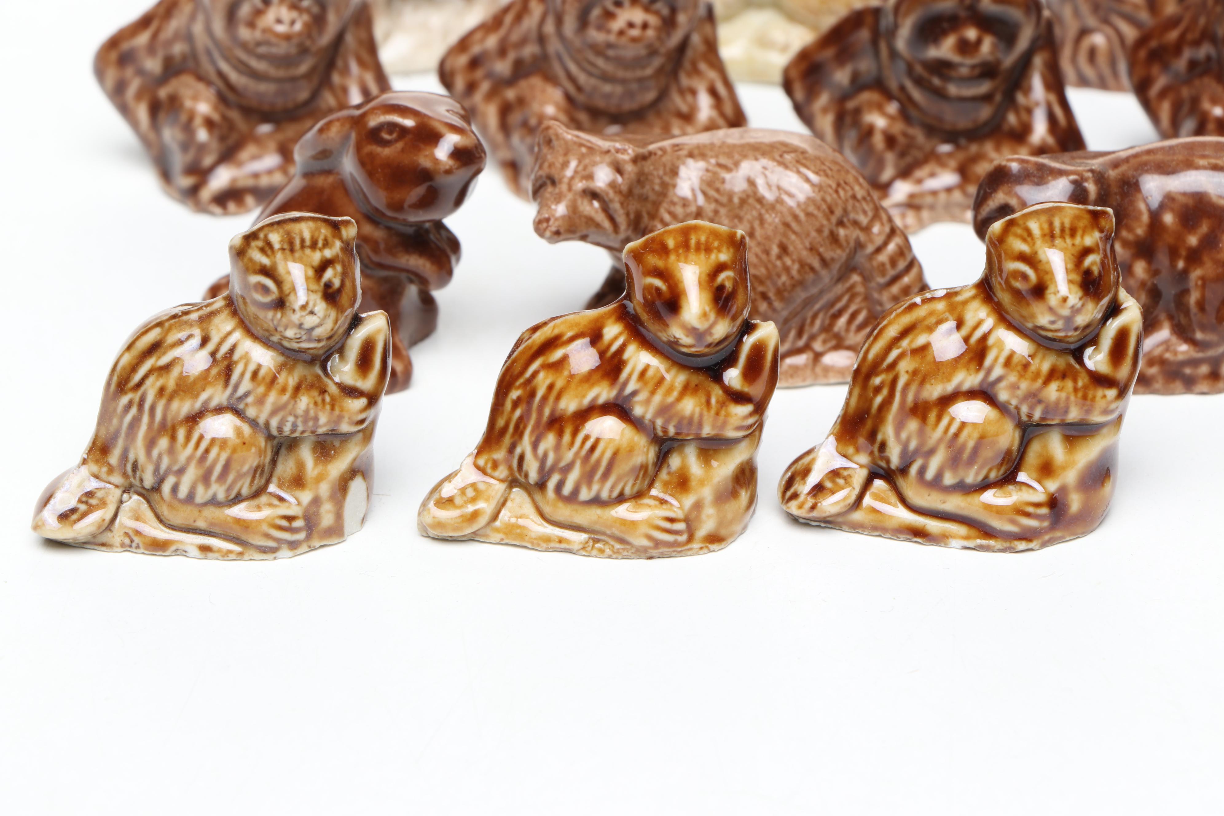 Animal Ceramic Figurines Featuring Raccoons, Rhinoceroses, and Giraffes