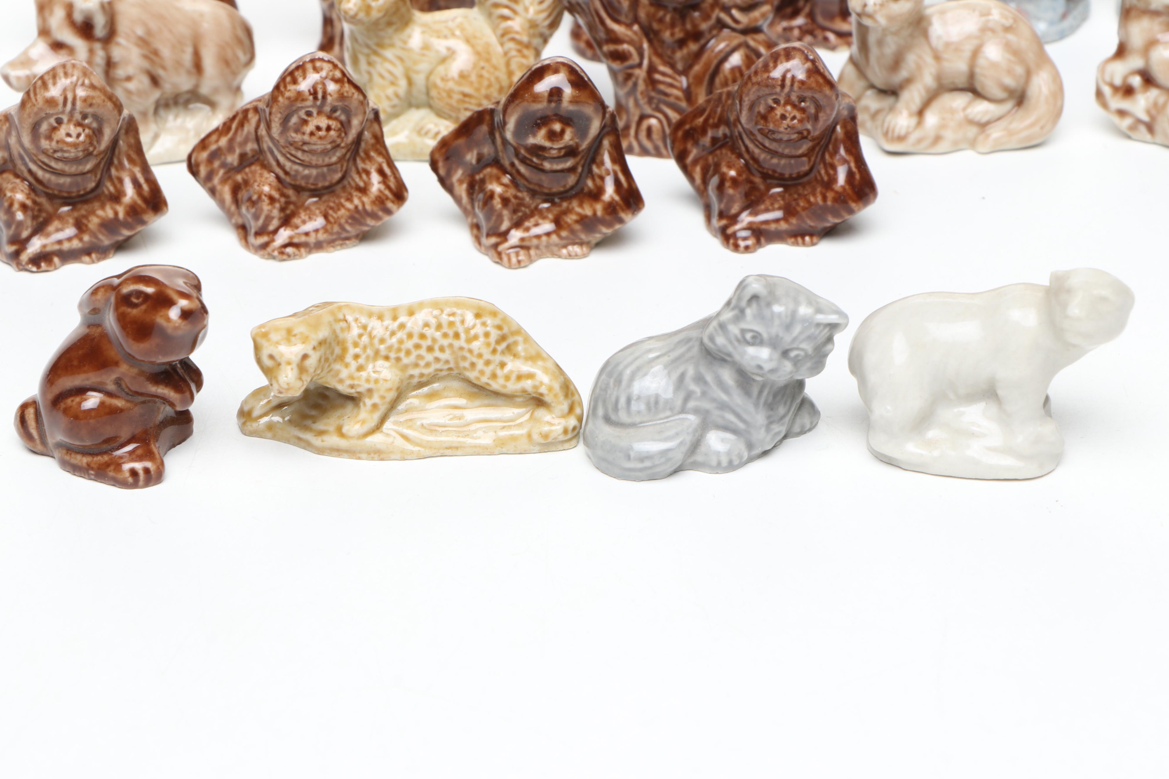Animal Ceramic Figurines Featuring Raccoons, Rhinoceroses, and Giraffes