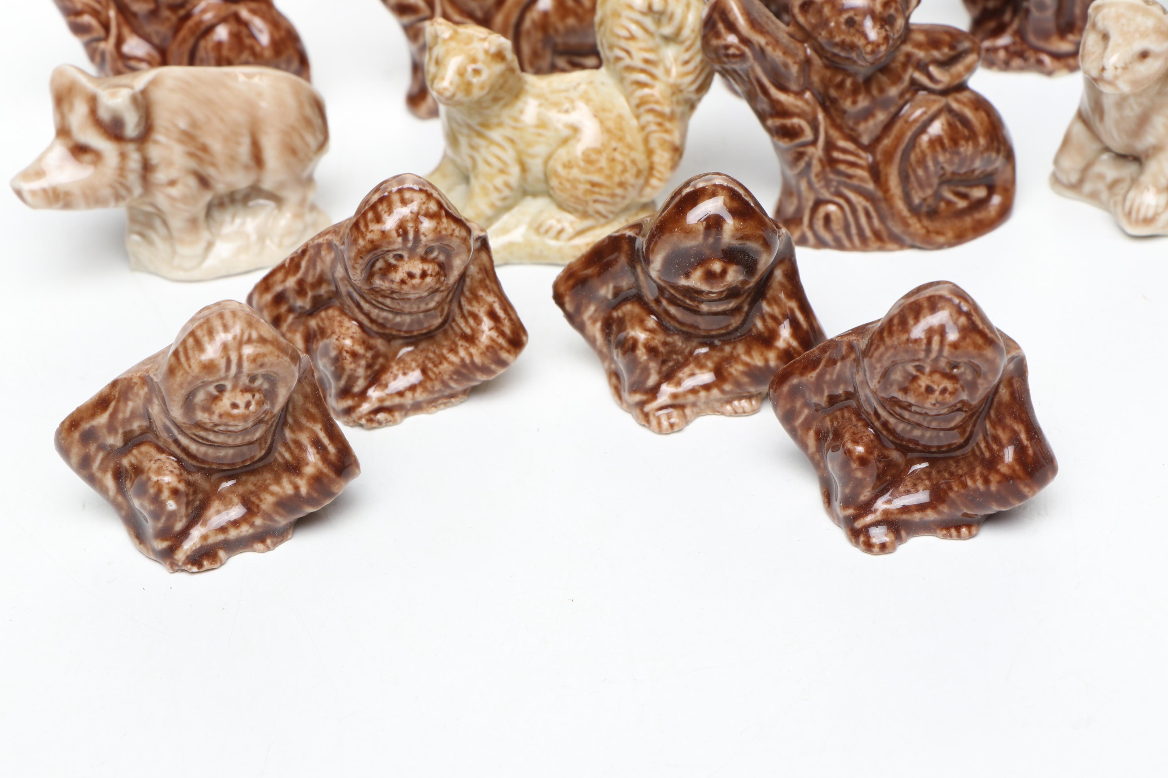 Animal Ceramic Figurines Featuring Raccoons, Rhinoceroses, and Giraffes