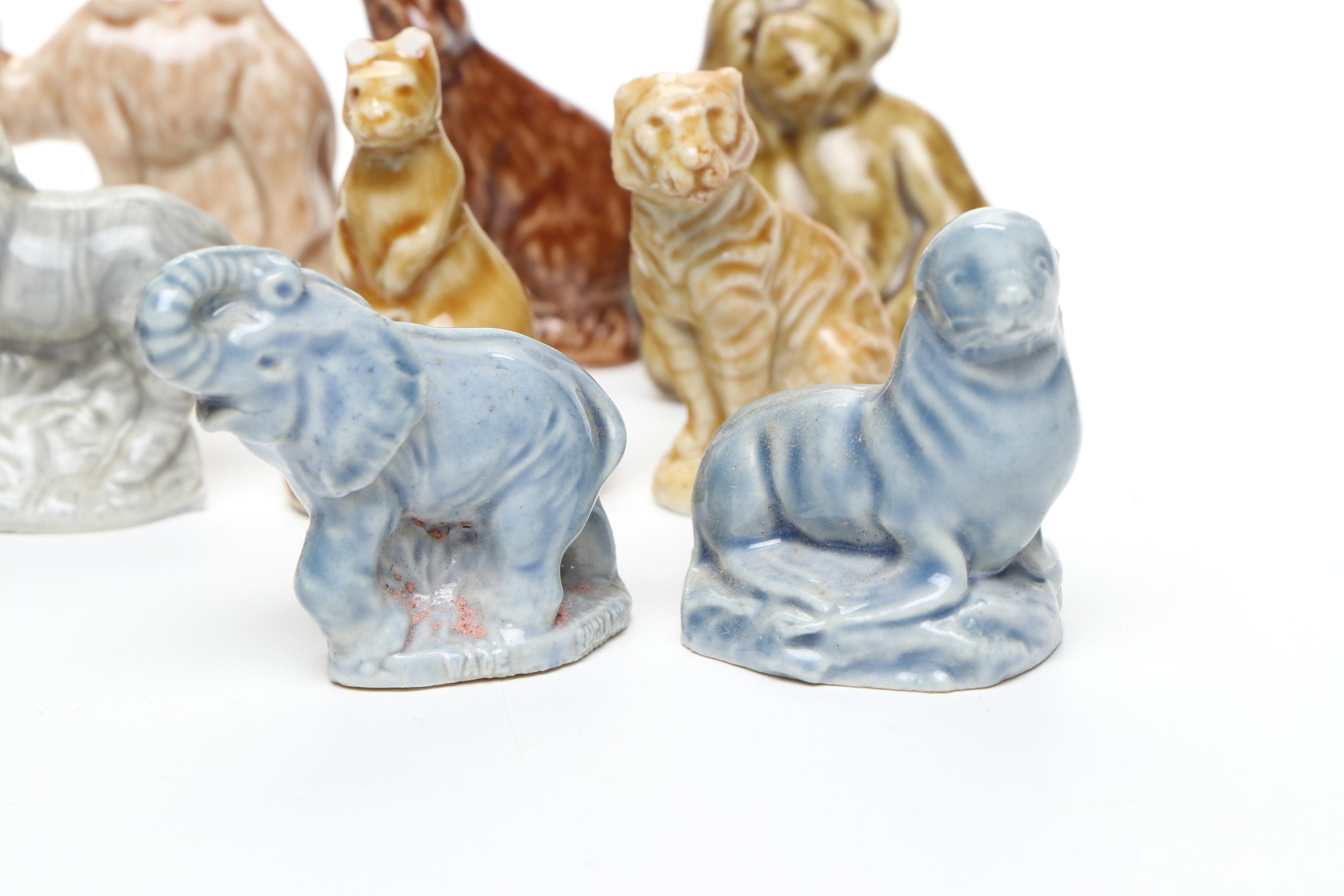 Animal Ceramic Figurines Featuring Raccoons, Rhinoceroses, and Giraffes