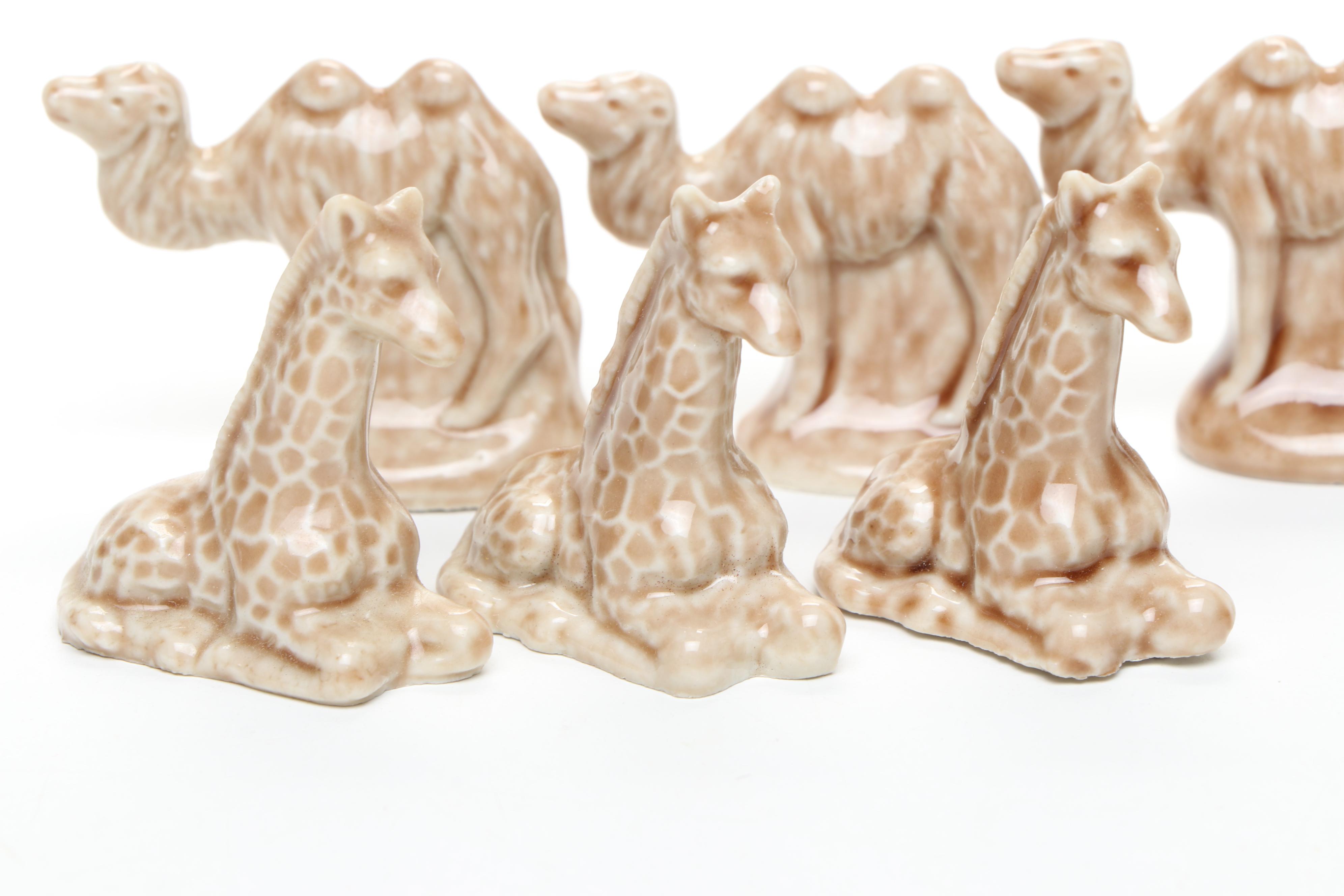 Animal Ceramic Figurines Featuring Raccoons, Rhinoceroses, and Giraffes