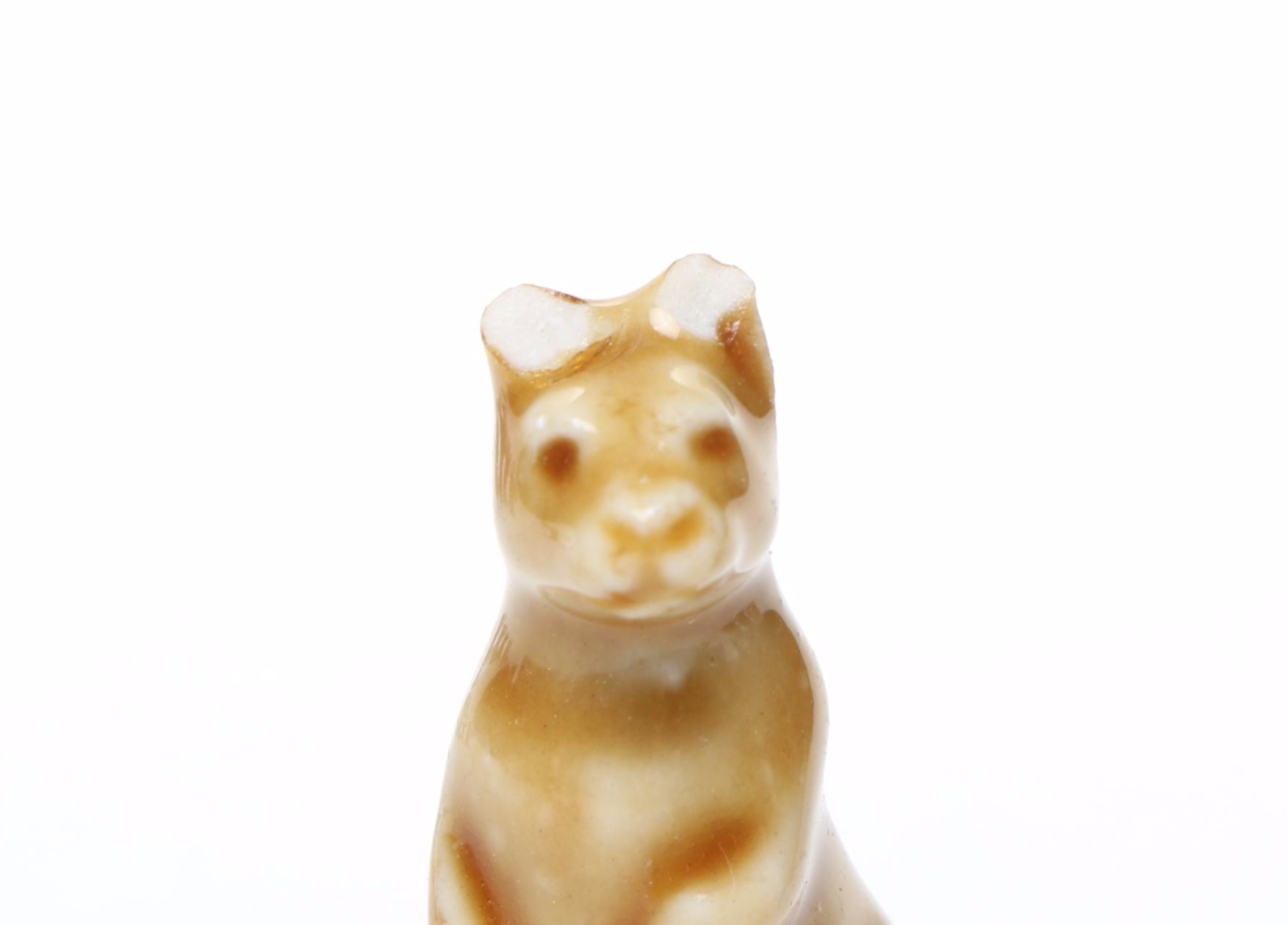 Animal Ceramic Figurines Featuring Raccoons, Rhinoceroses, and Giraffes