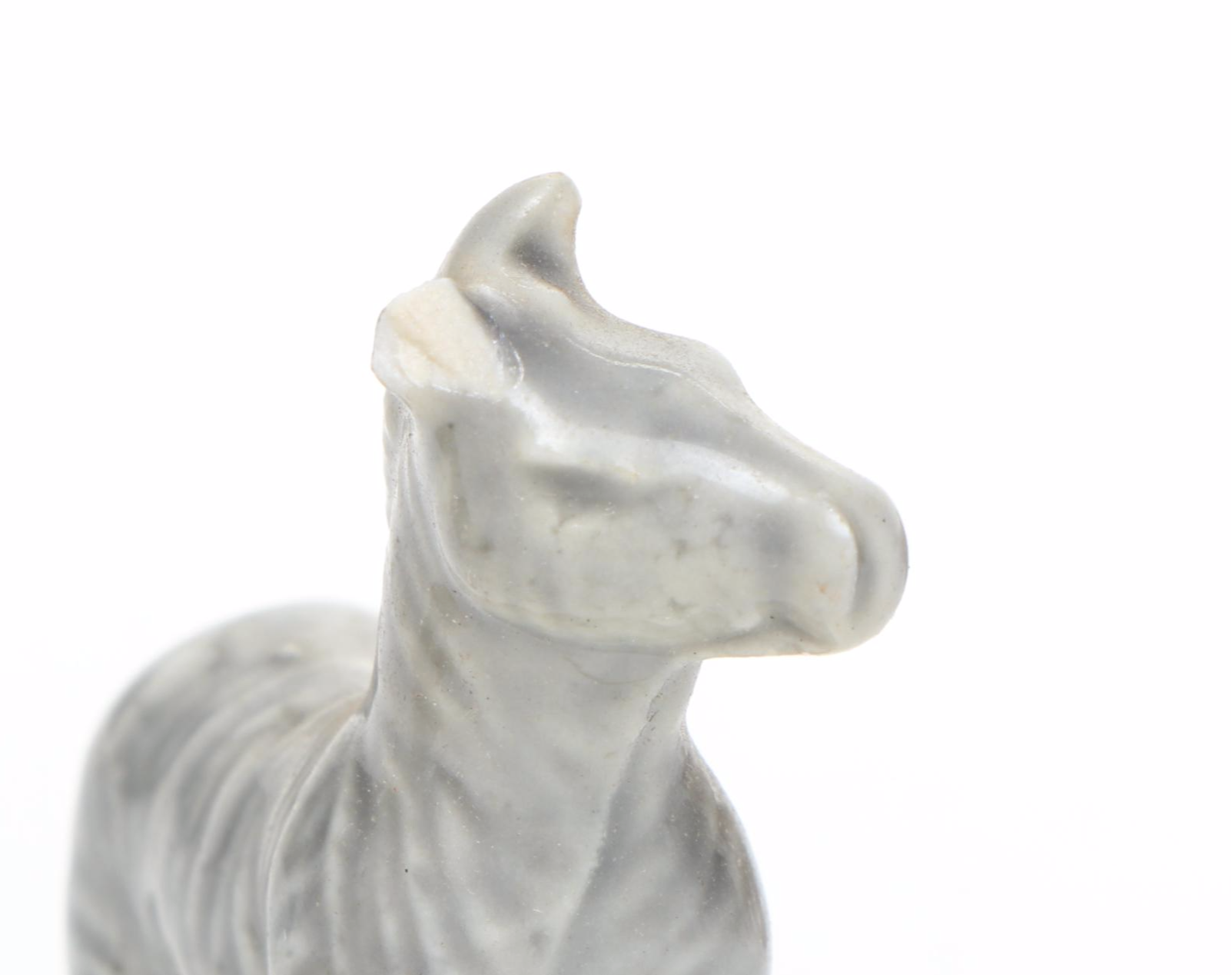 Animal Ceramic Figurines Featuring Raccoons, Rhinoceroses, and Giraffes