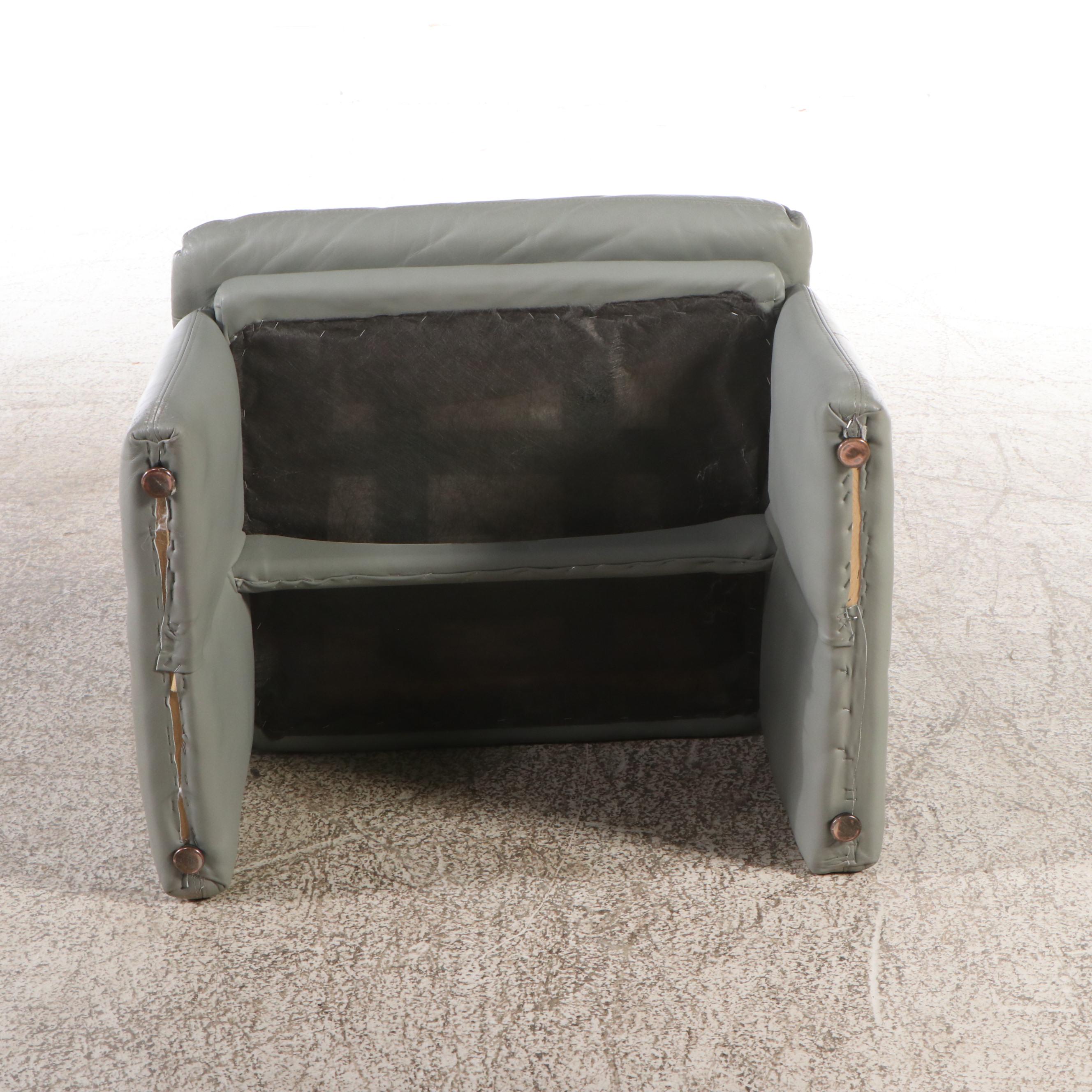 Carson's Modernist Grey Leather Armchair and Ottoman, Late 20th Century