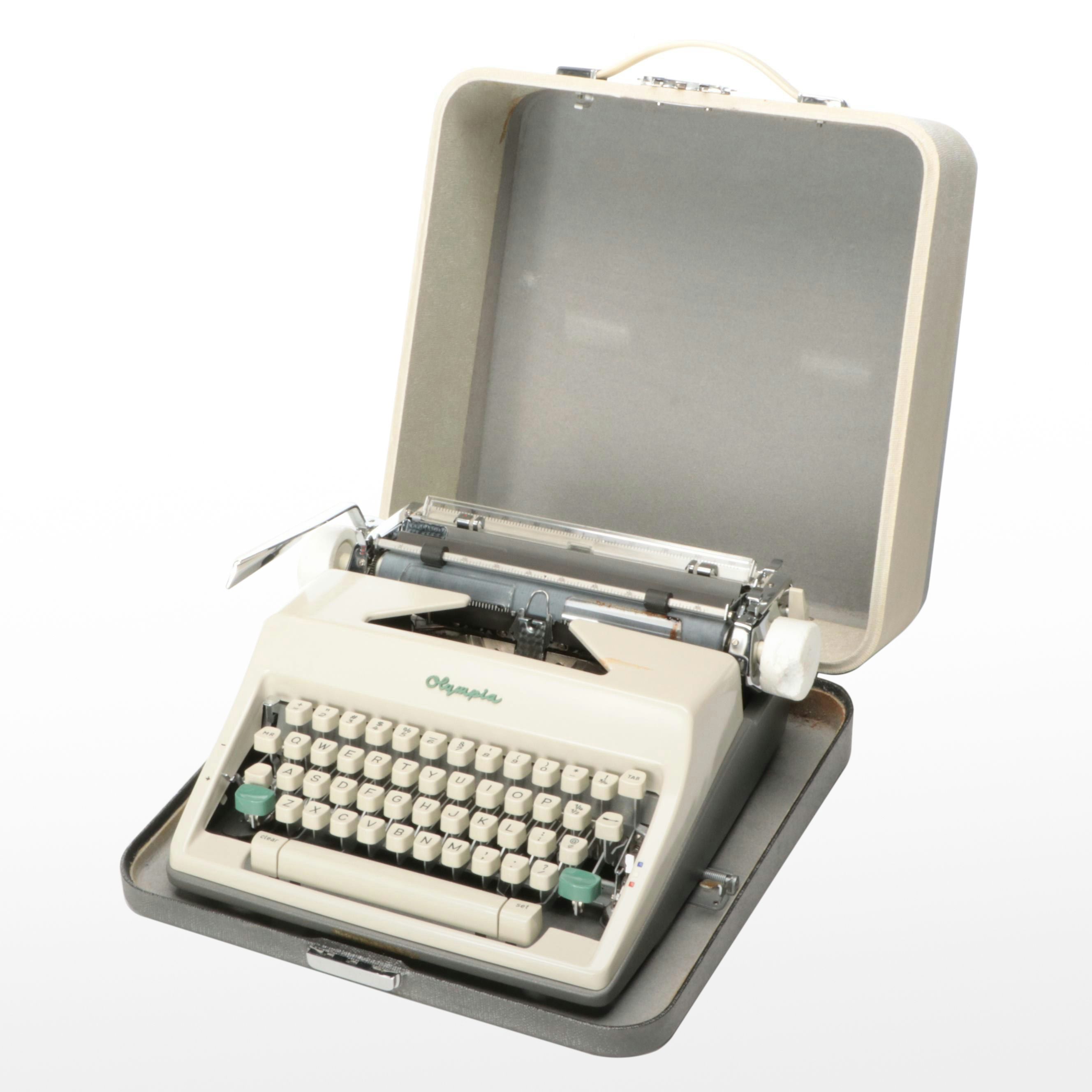 Olympia SM9 Manual Portable Typewriter with Carrying Case, 1970s