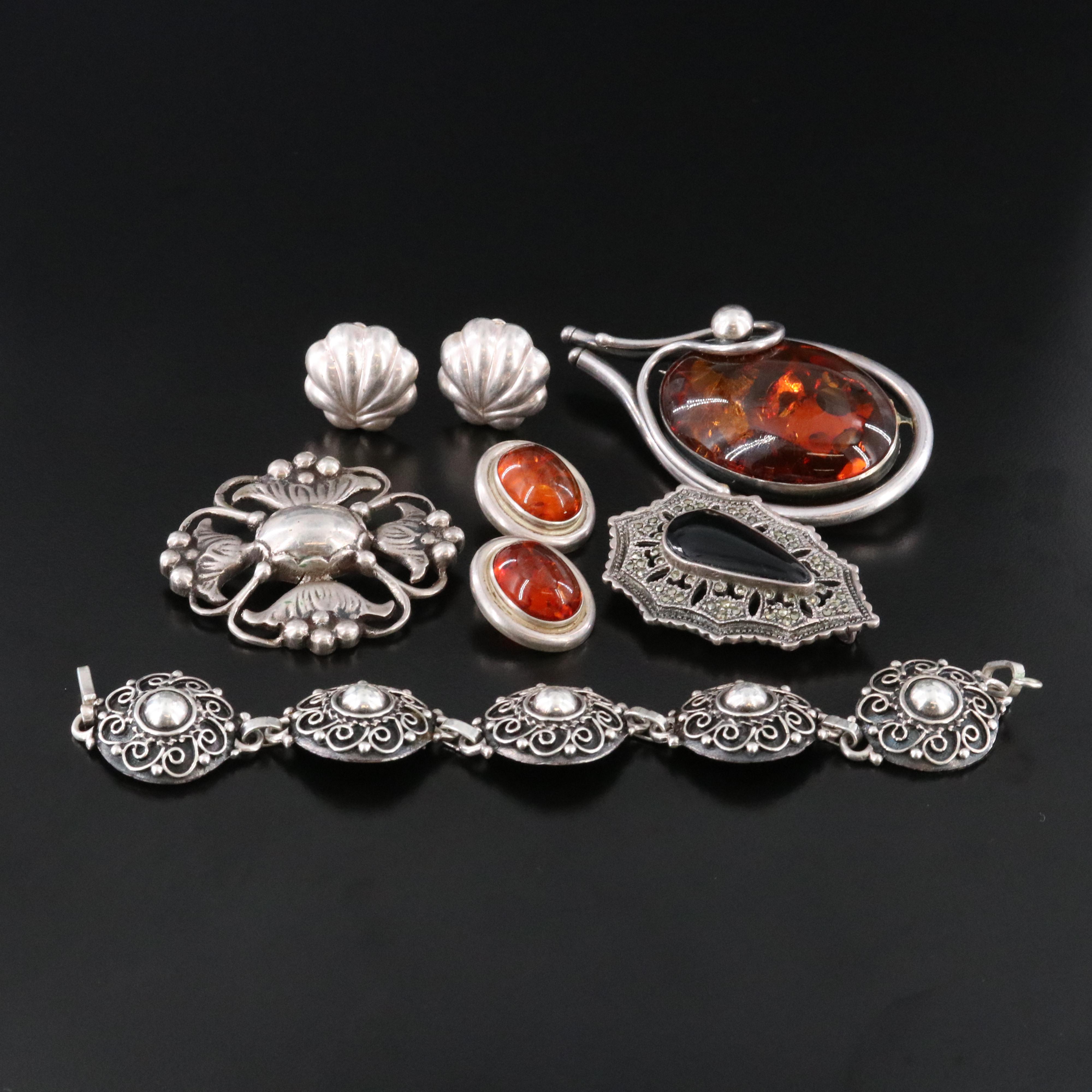 Amber and Black Onyx Featured in Sterling Jewelry